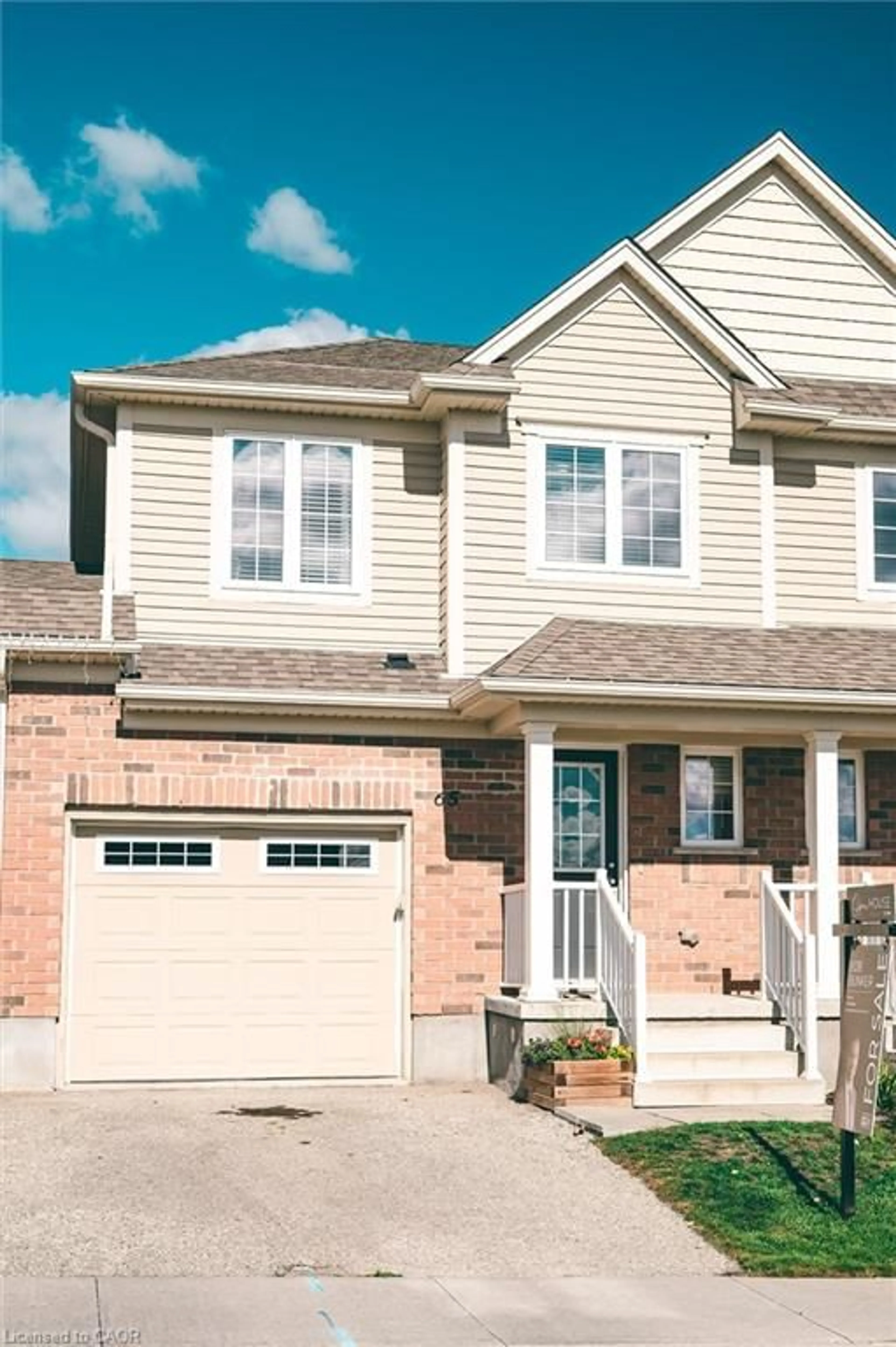 Home with brick exterior material, street for 65 Grand Flats Trail, Kitchener Ontario N2A 0J8