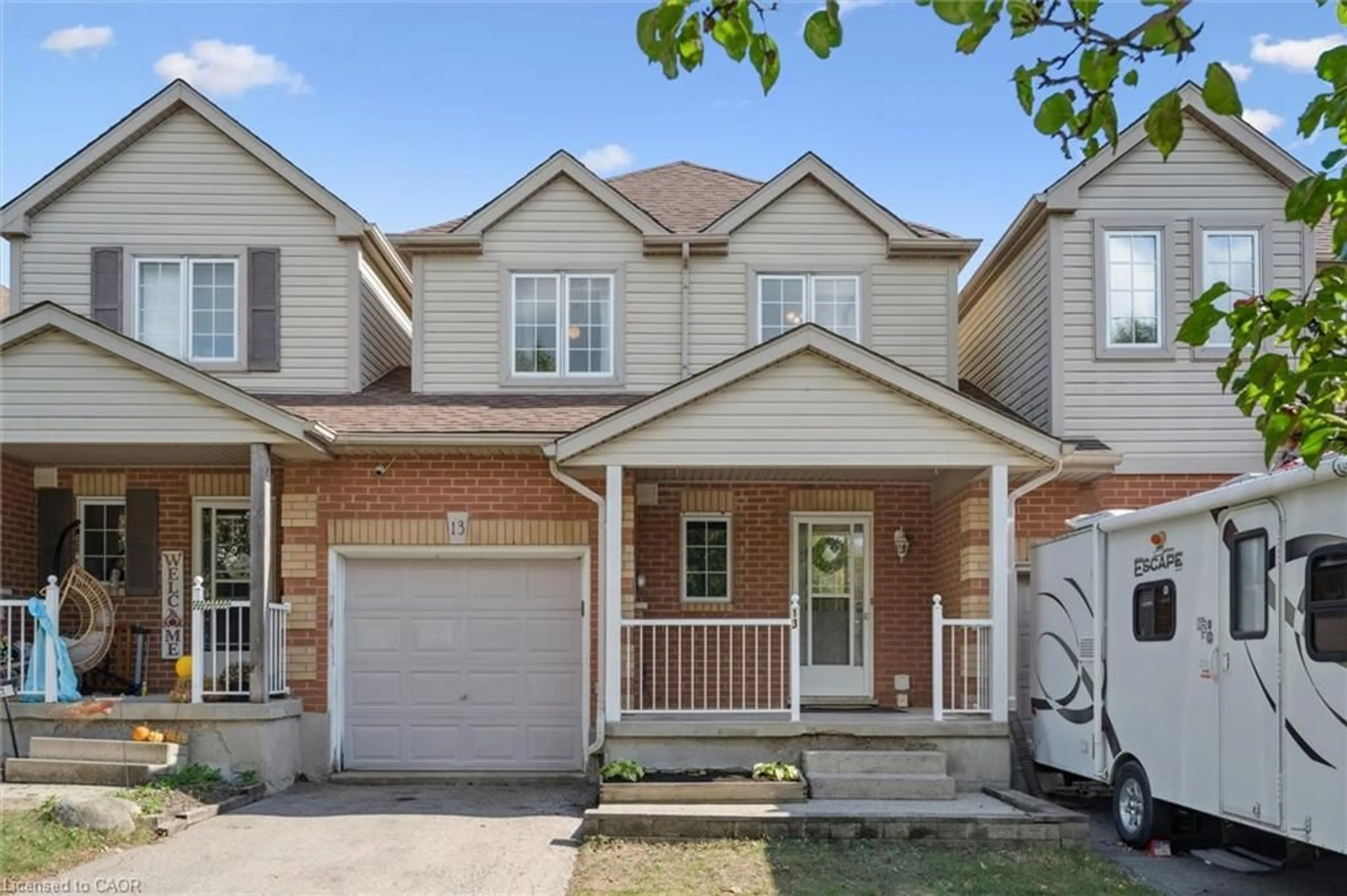 Home with brick exterior material, street for 13 Harness Lane, Woolwich Ontario N3B 3K5