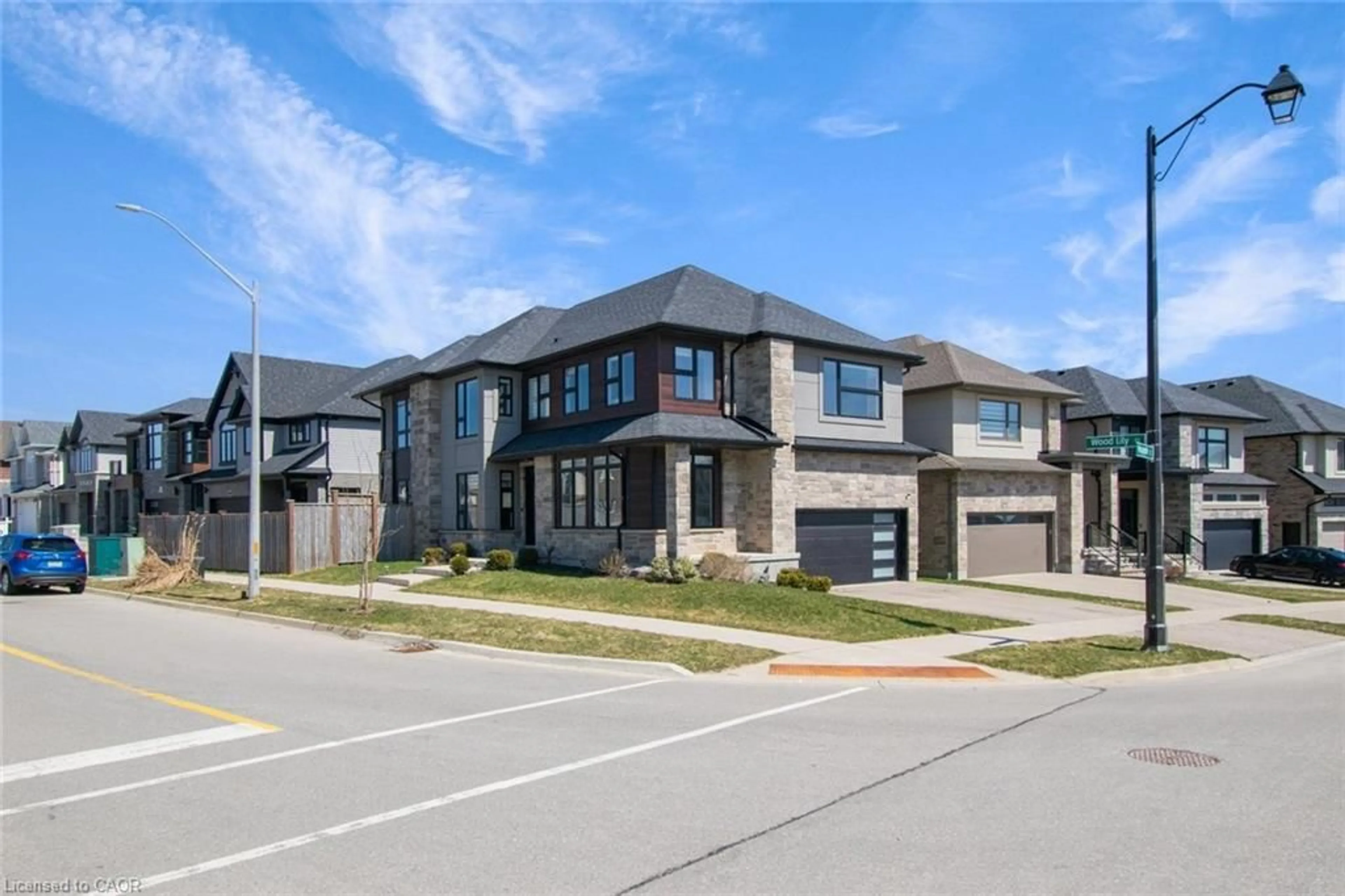 Home with brick exterior material, street for 556 Mayapple St, Waterloo Ontario N2V 0C3