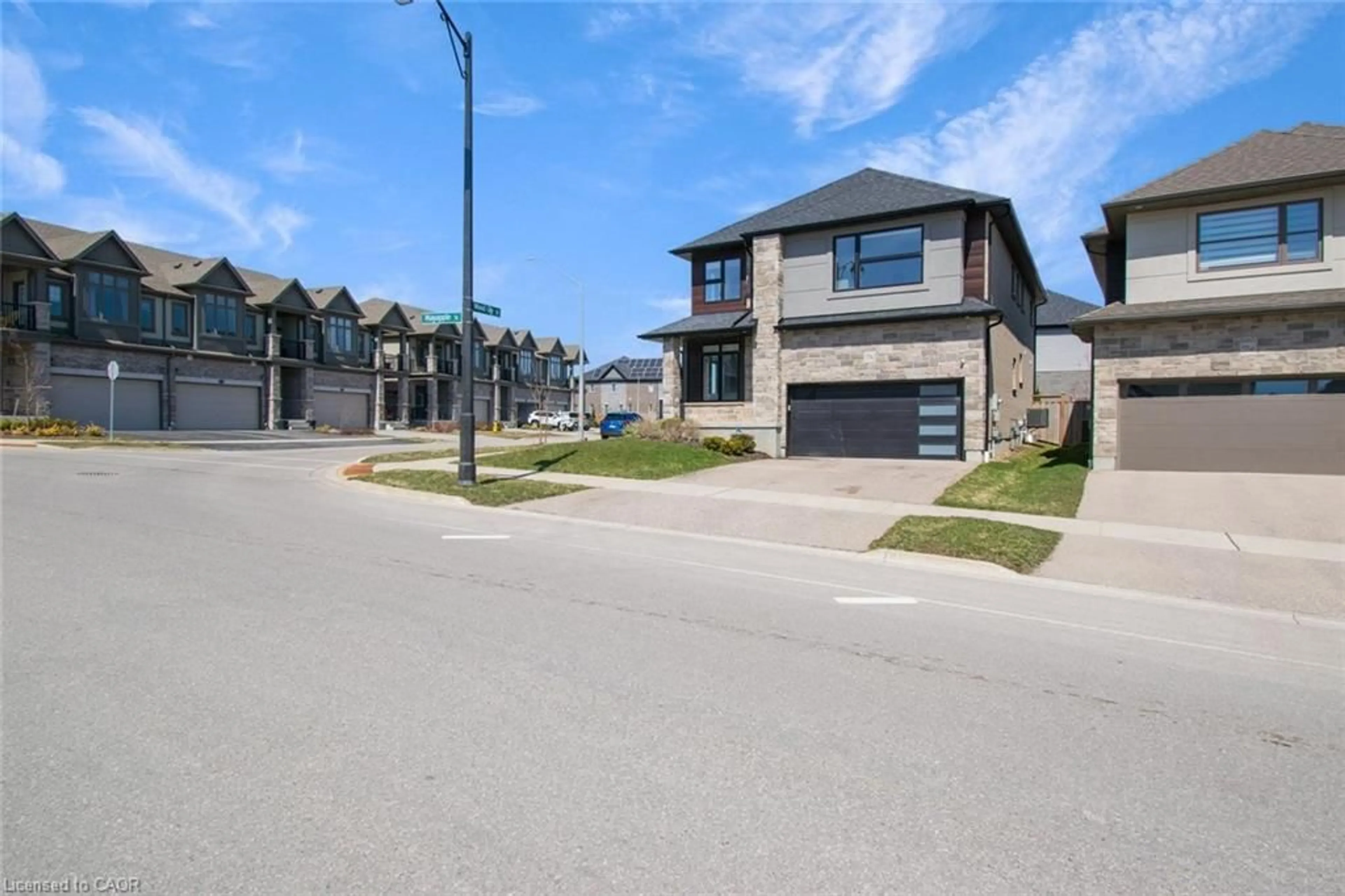 Home with brick exterior material, street for 556 Mayapple St, Waterloo Ontario N2V 0C3