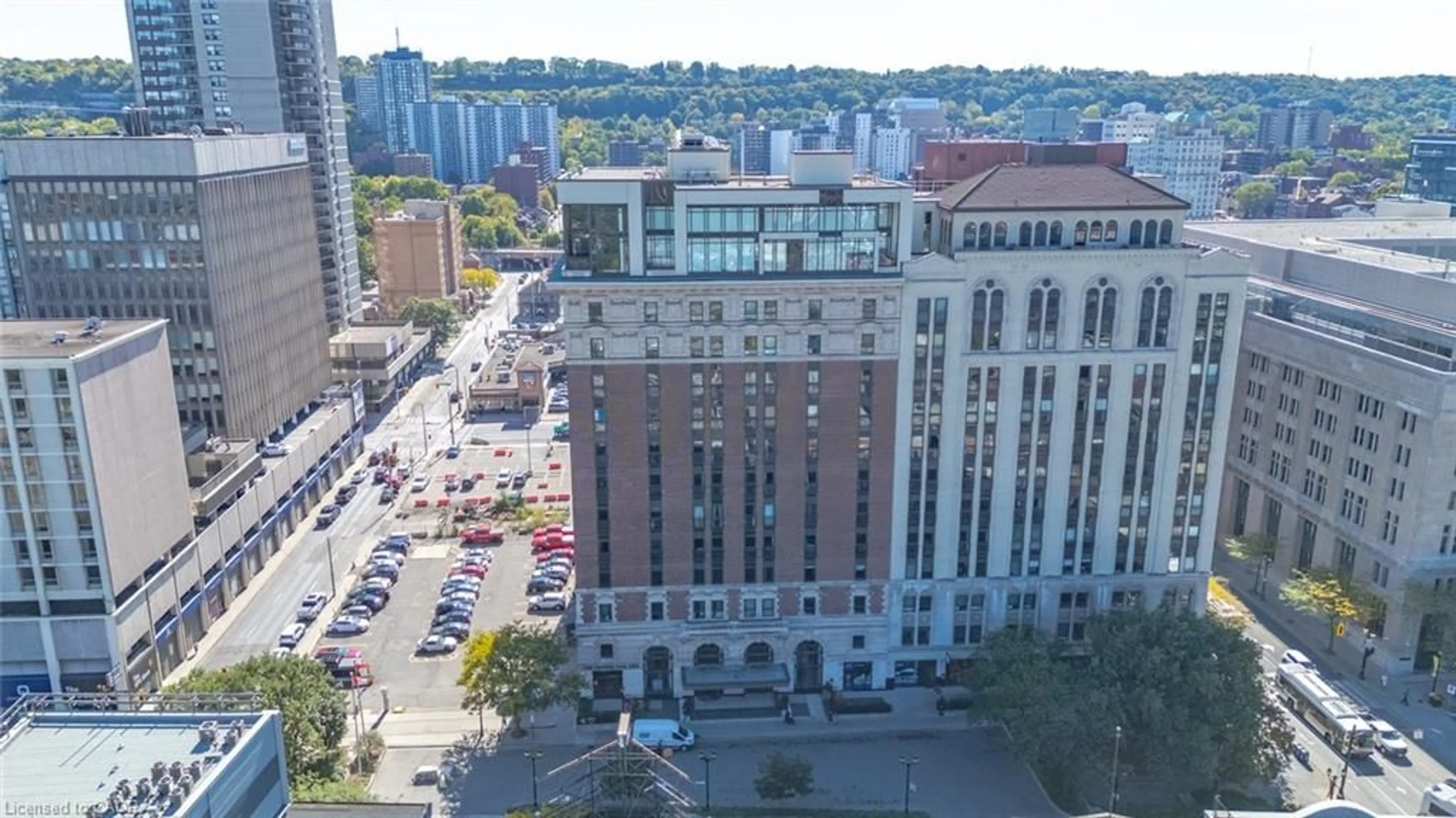 A pic from outside/outdoor area/front of a property/back of a property/a pic from drone, city buildings view from balcony for 118 King St #520, Hamilton Ontario L8N 0A9