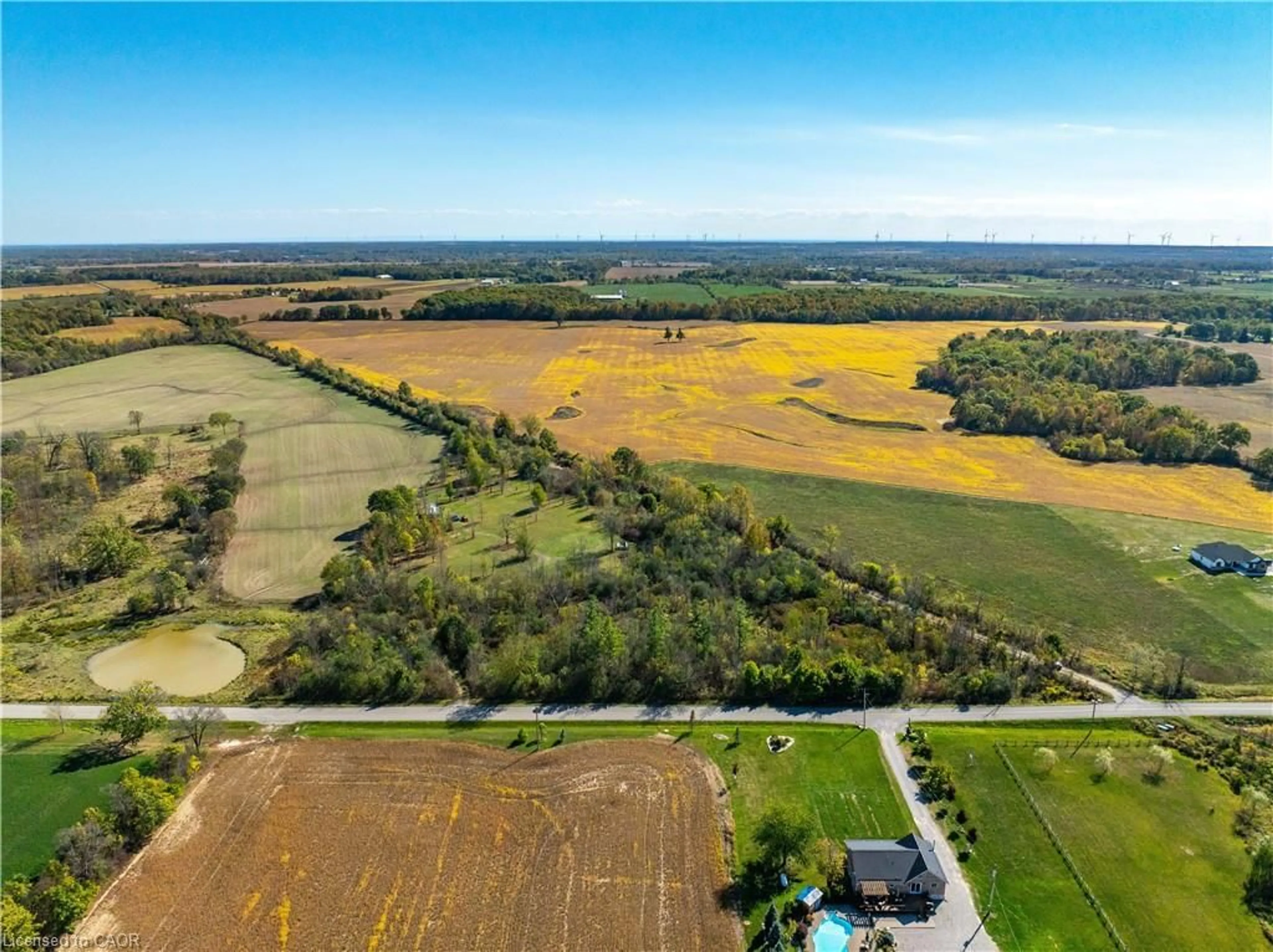 A pic from outside/outdoor area/front of a property/back of a property/a pic from drone, water/lake/river/ocean view for 1320 Concession 1 Rd, Canfield Ontario N0A 1C0