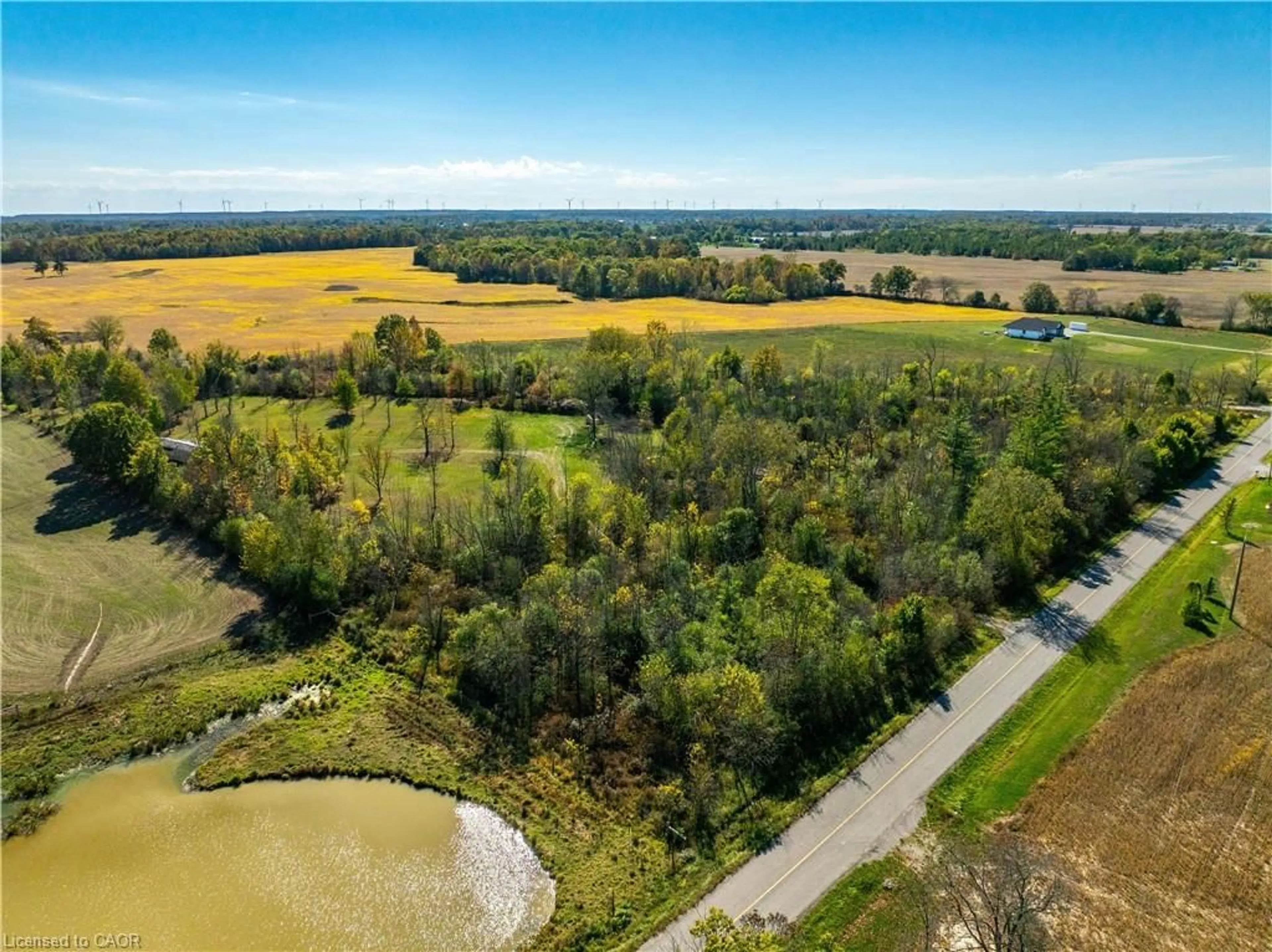 A pic from outside/outdoor area/front of a property/back of a property/a pic from drone, water/lake/river/ocean view for 1320 Concession 1 Rd, Canfield Ontario N0A 1C0