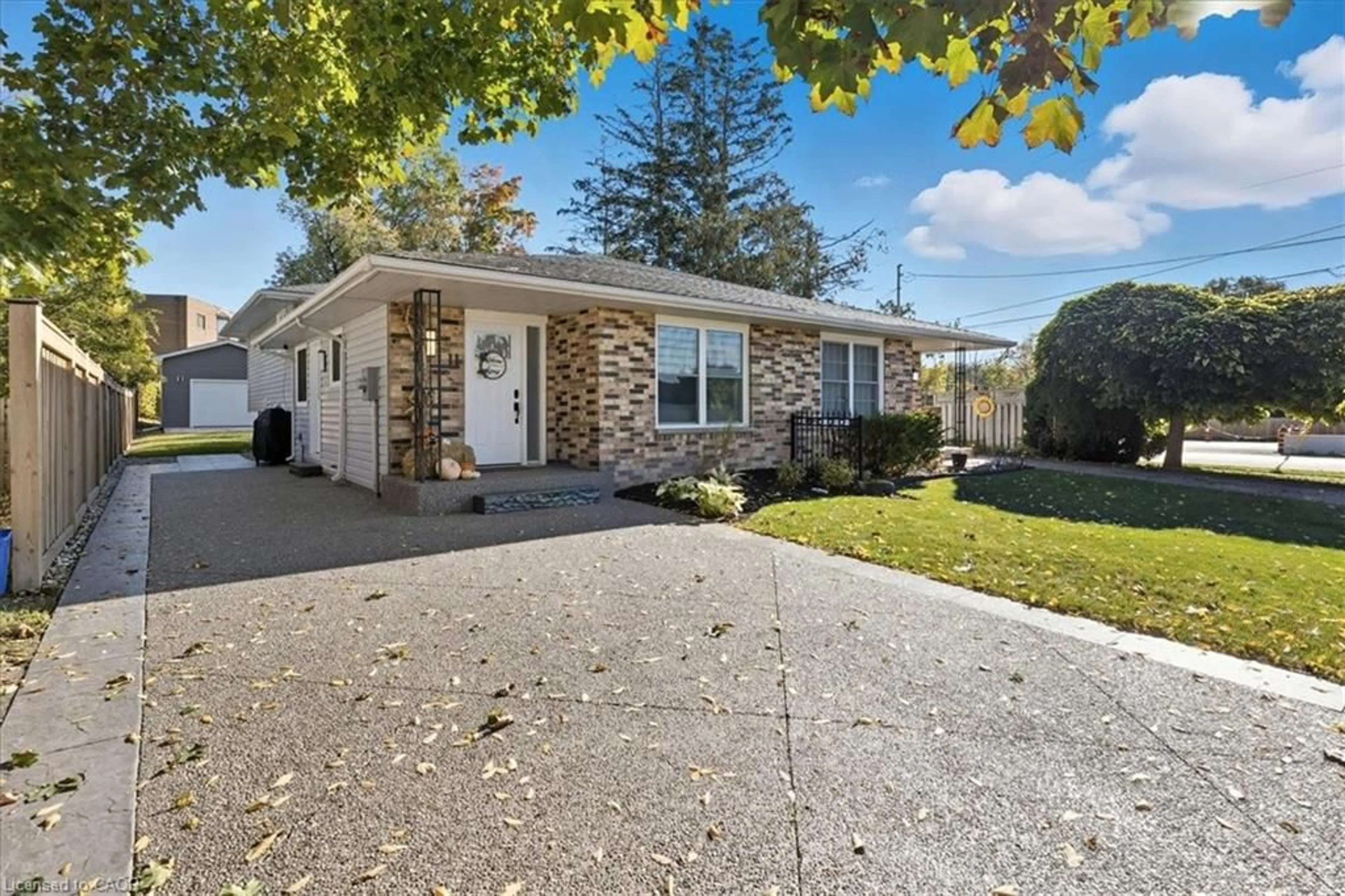 Home with vinyl exterior material, street for 11 Macdonald St, Ayr Ontario N0B 1E0