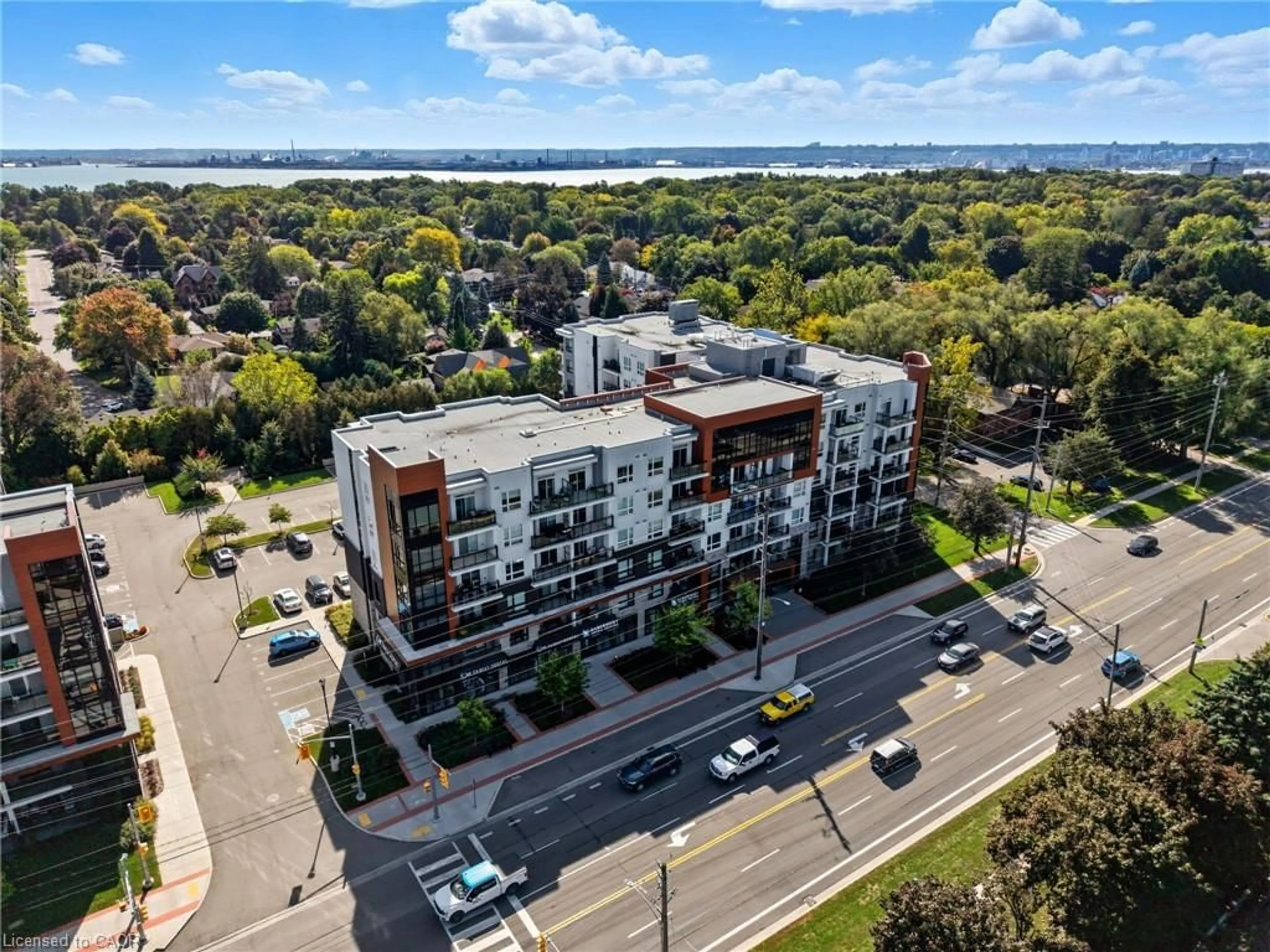 A pic from outside/outdoor area/front of a property/back of a property/a pic from drone, building for 320 Plains Rd #307, Burlington Ontario L7T 0C1