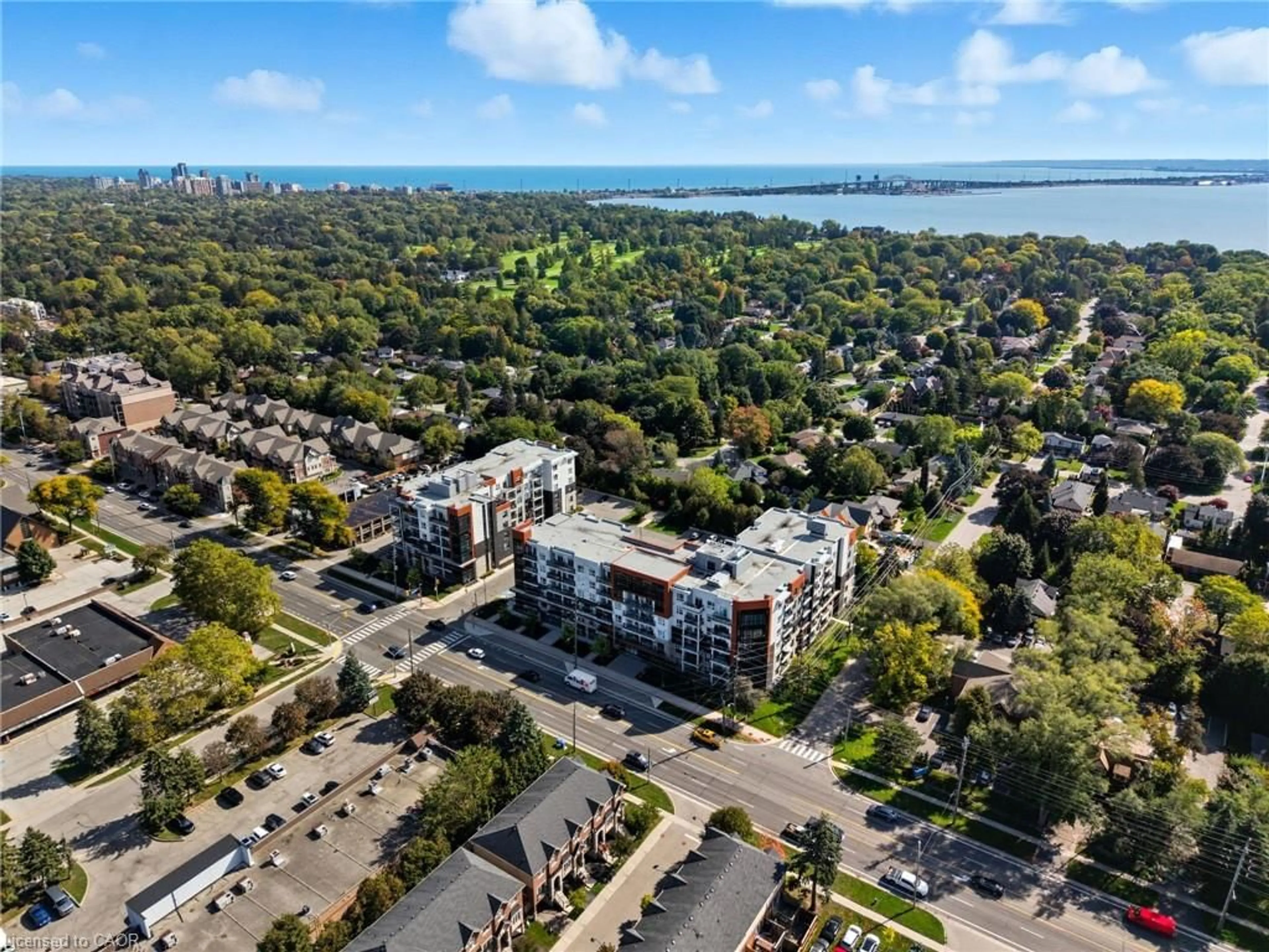 A pic from outside/outdoor area/front of a property/back of a property/a pic from drone, city buildings view from balcony for 320 Plains Rd #307, Burlington Ontario L7T 0C1