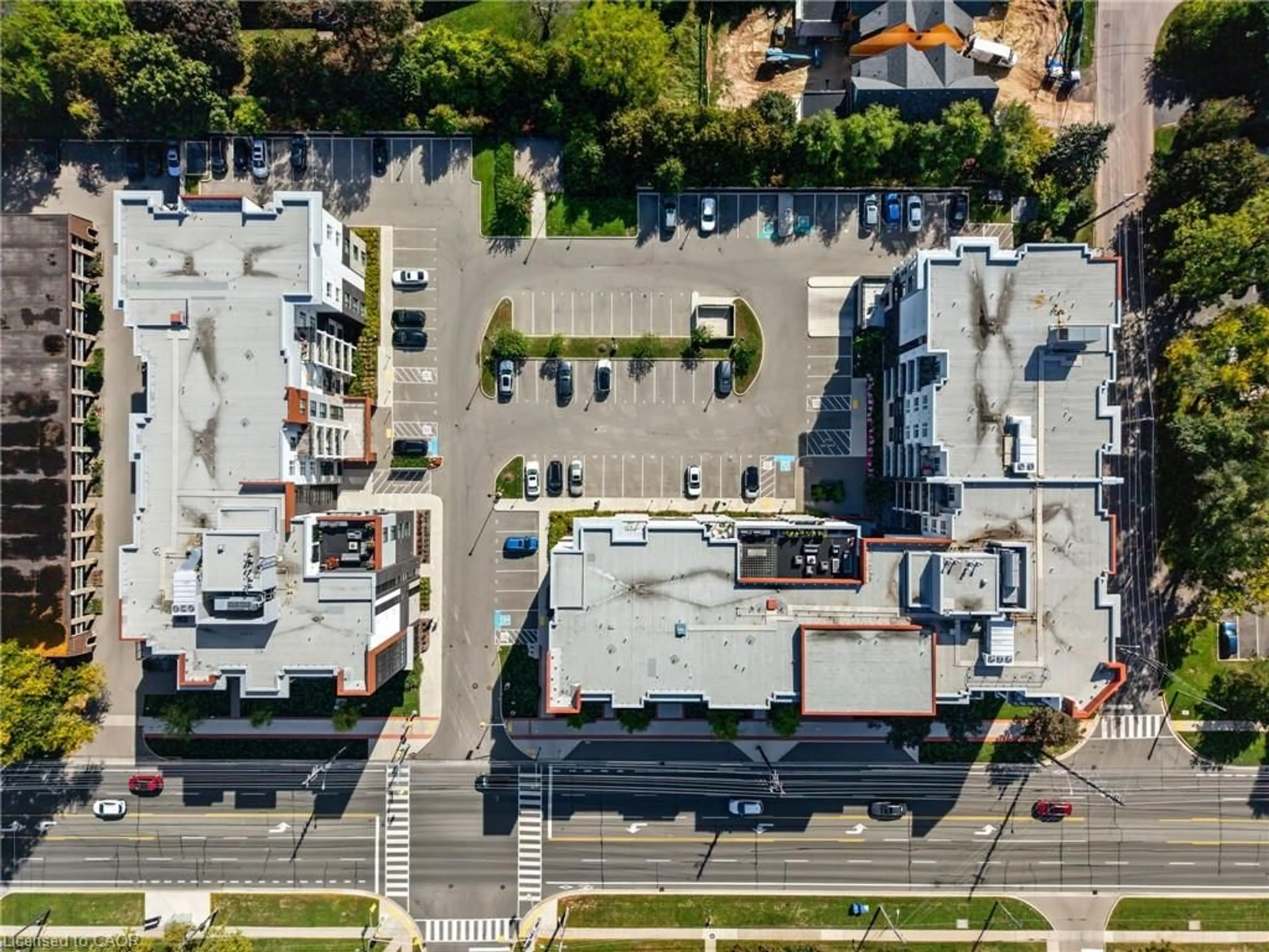 A pic from outside/outdoor area/front of a property/back of a property/a pic from drone, street for 320 Plains Rd #307, Burlington Ontario L7T 0C1