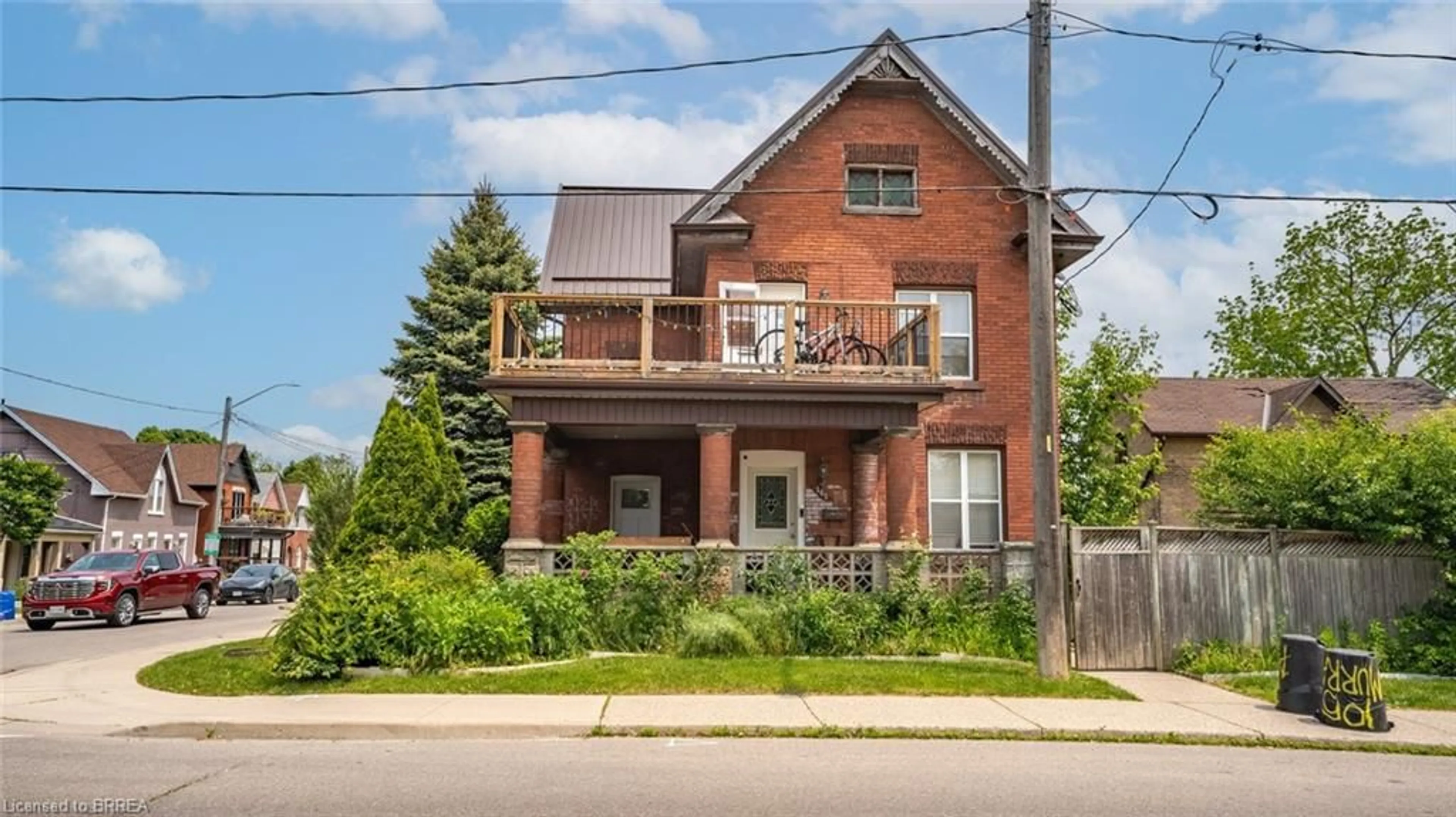 Home with brick exterior material, street for 65 Victoria St, Brantford Ontario N3S 3K3