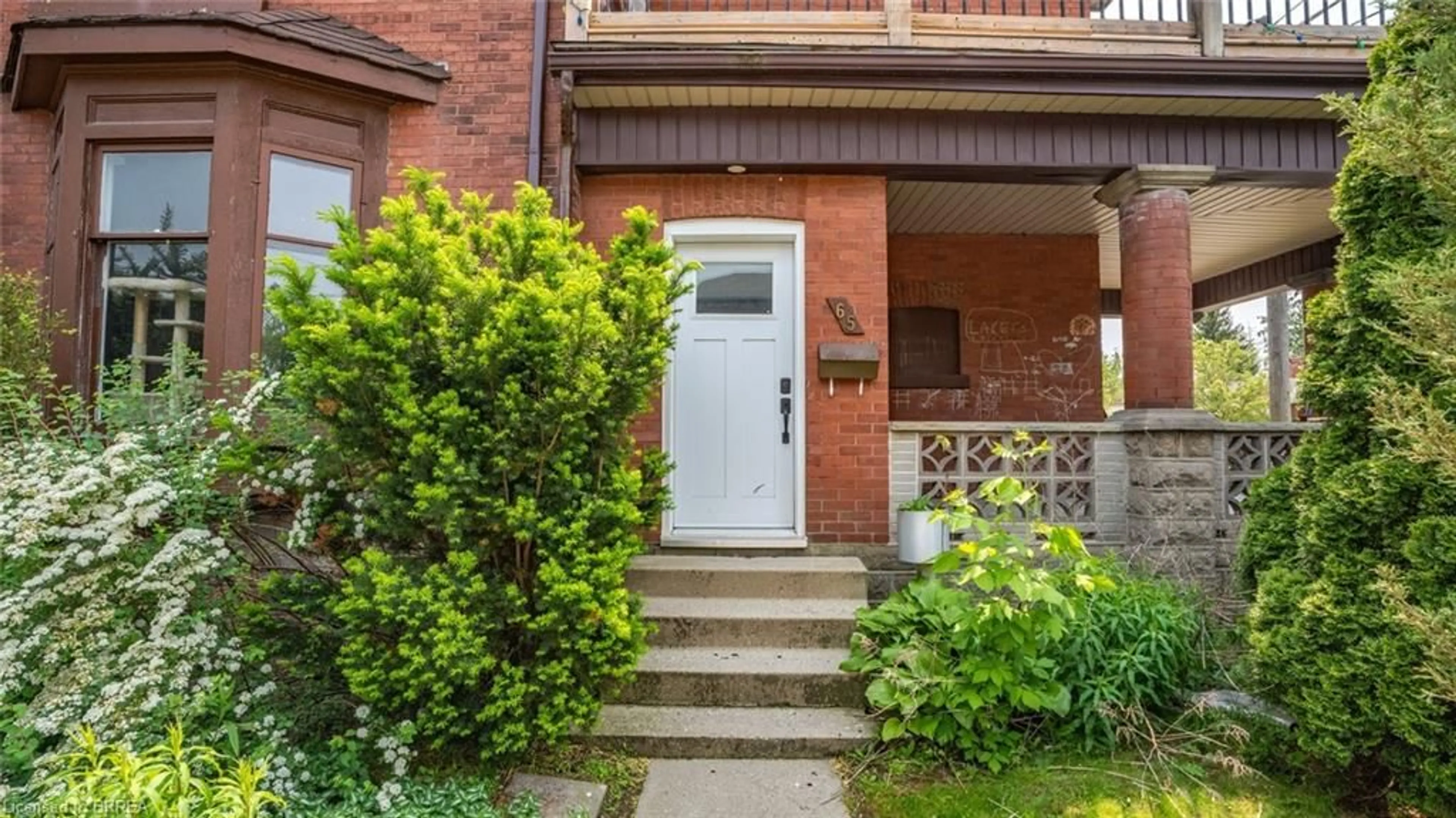 Home with brick exterior material, street for 65 Victoria St, Brantford Ontario N3S 3K3