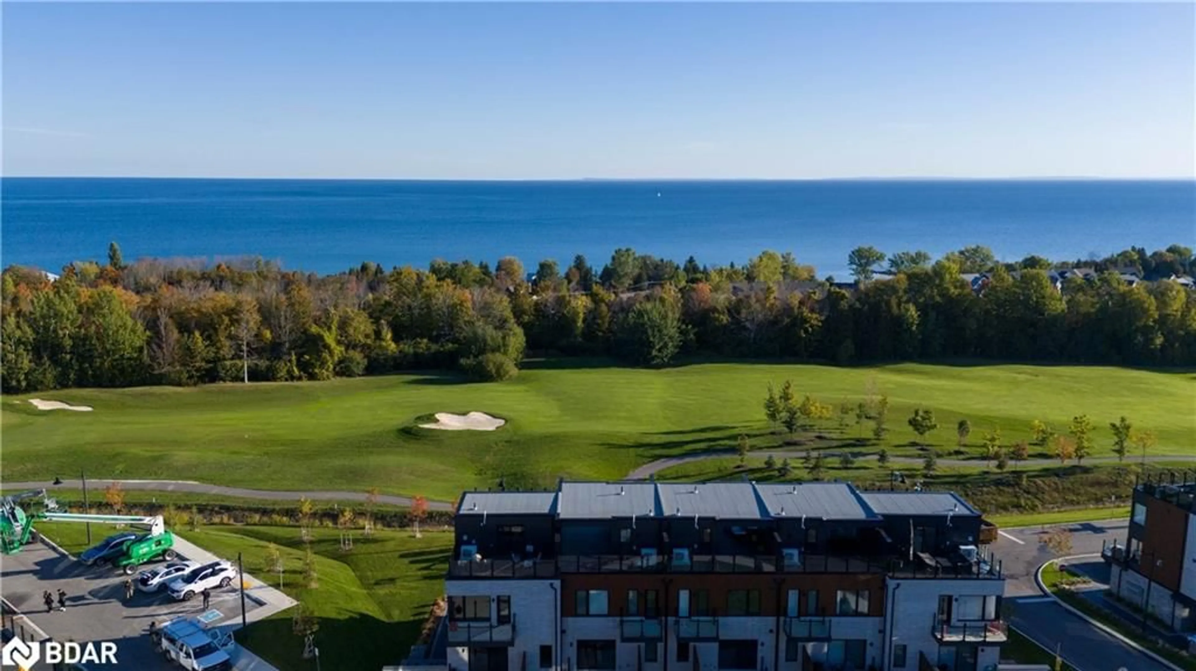 A pic from outside/outdoor area/front of a property/back of a property/a pic from drone, water/lake/river/ocean view for 117 Sladden Court Crt, Thornbury Ontario N0H 2P0
