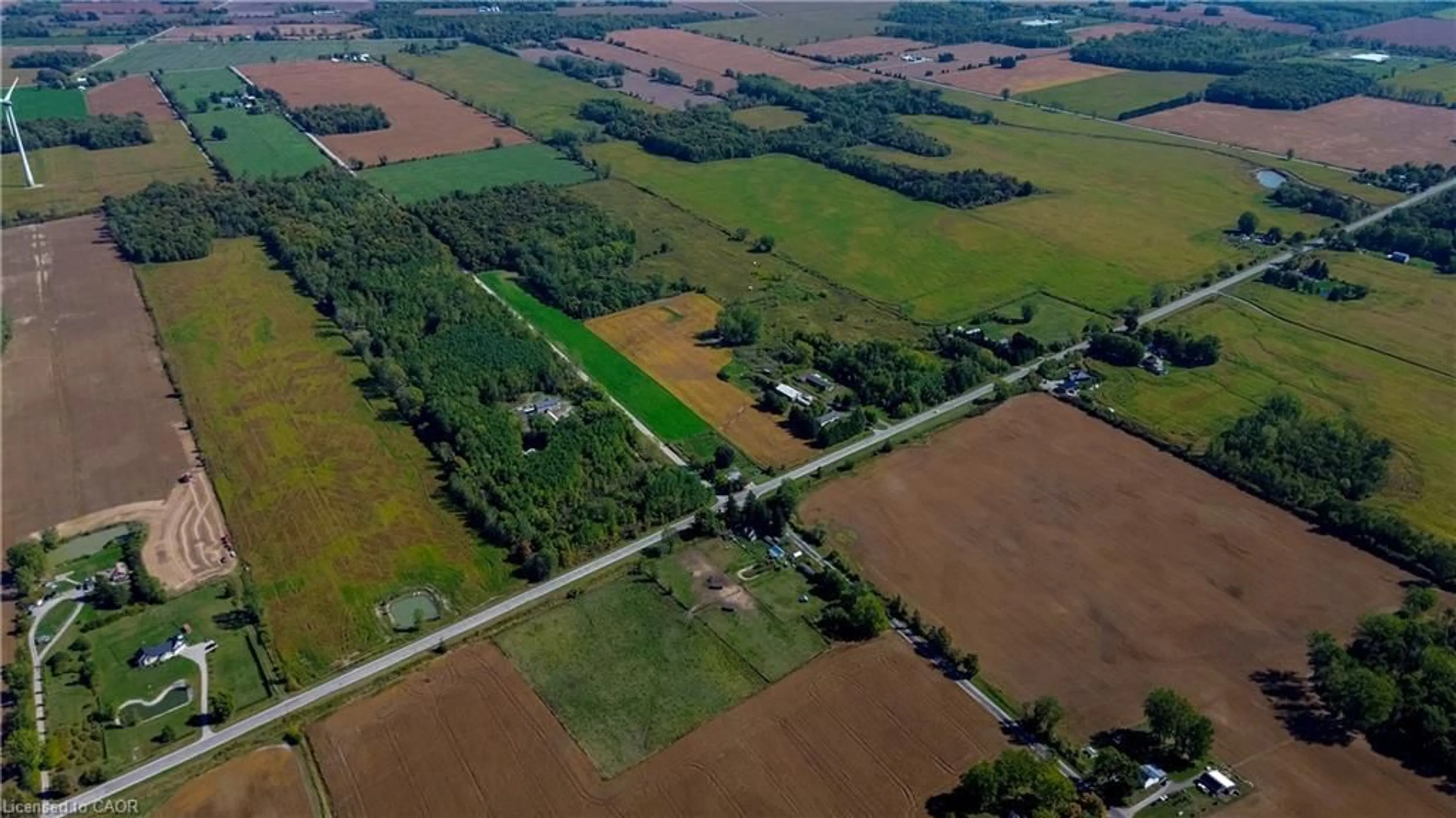 A pic from outside/outdoor area/front of a property/back of a property/a pic from drone, street for 940 Hutchinson Rd, Lowbanks Ontario N0A 1K0