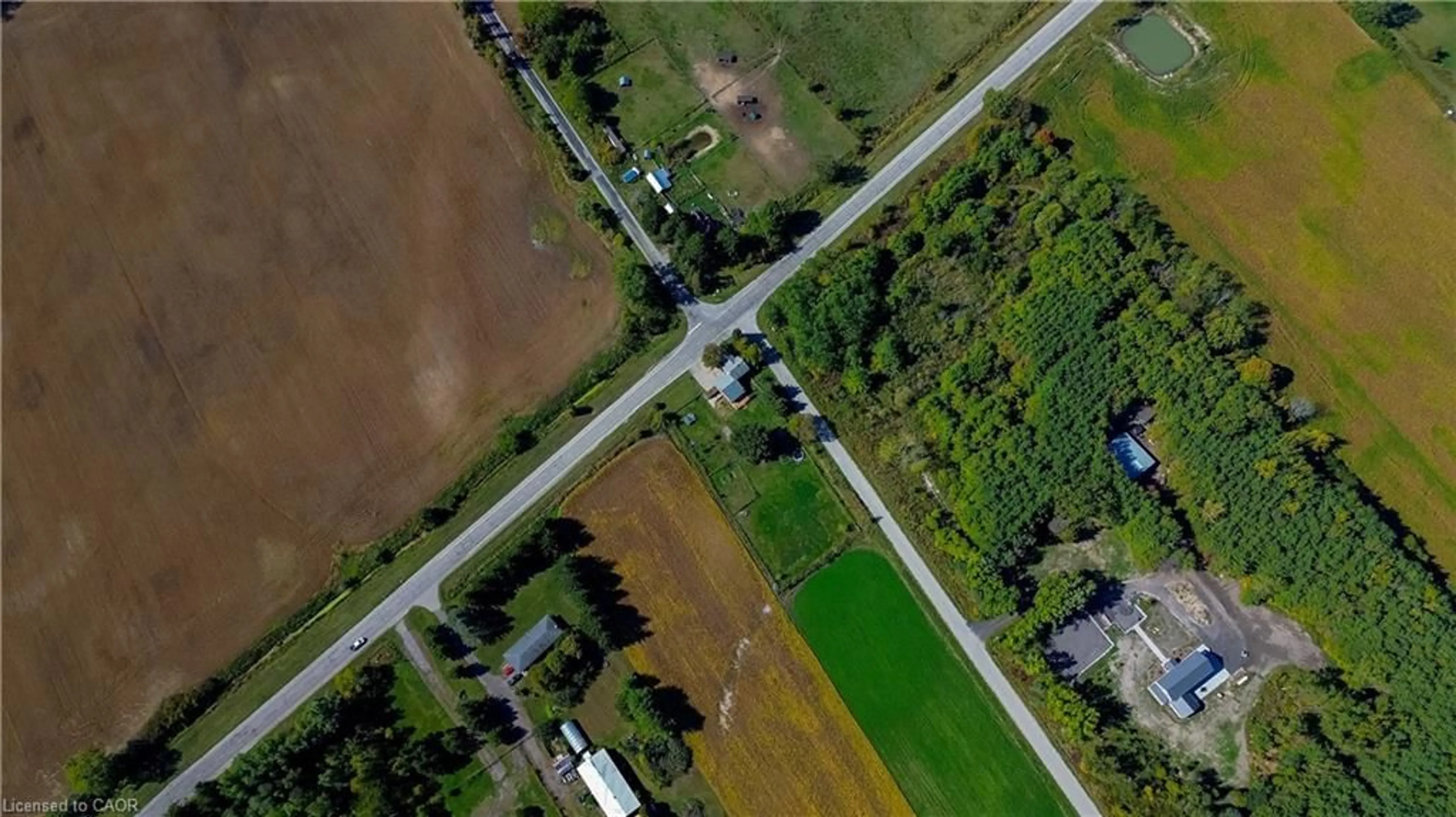 A pic from outside/outdoor area/front of a property/back of a property/a pic from drone, street for 940 Hutchinson Rd, Lowbanks Ontario N0A 1K0