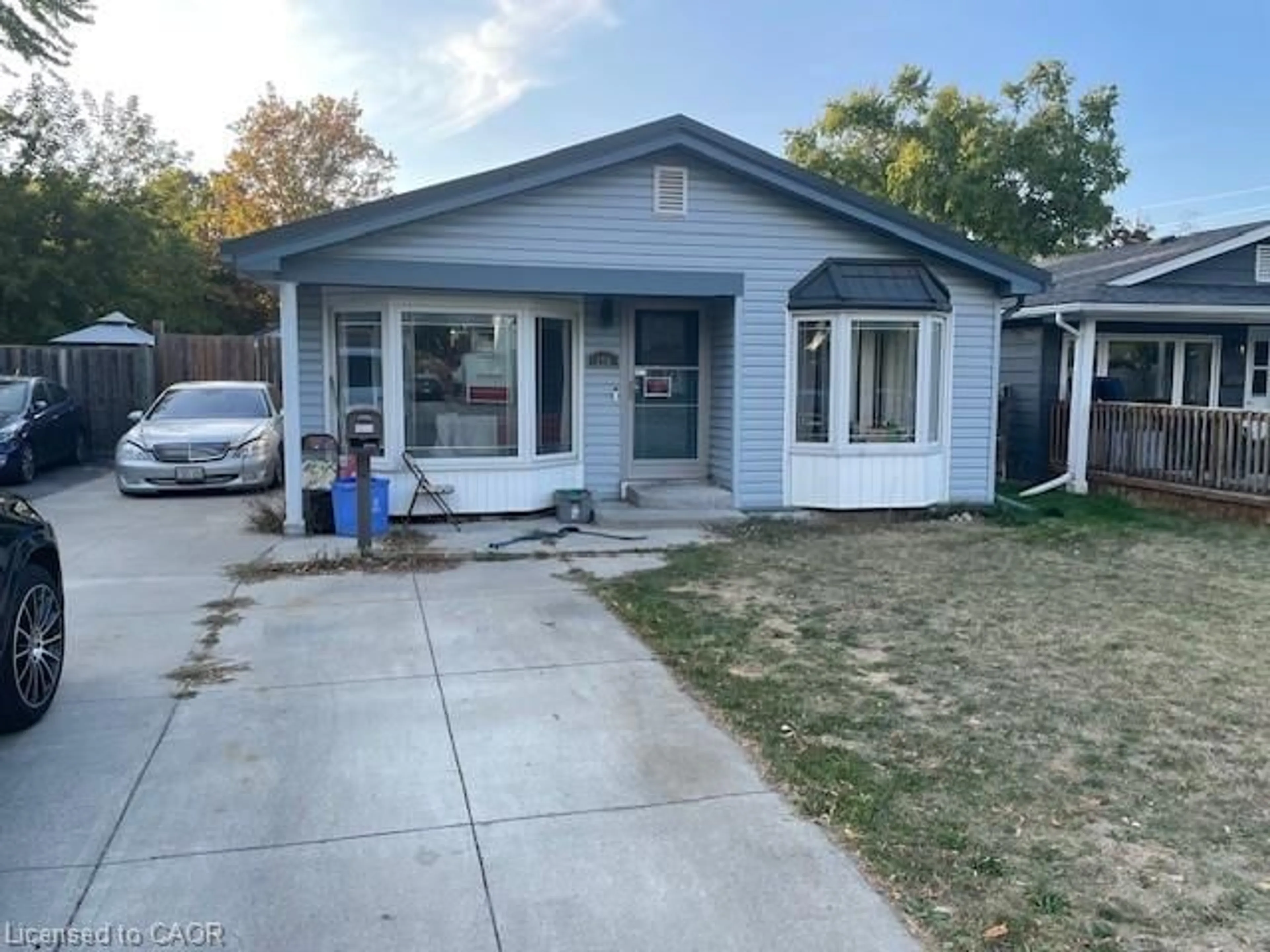 Home with vinyl exterior material, street for 156 Traynor Ave, Kitchener Ontario N2C 1W5