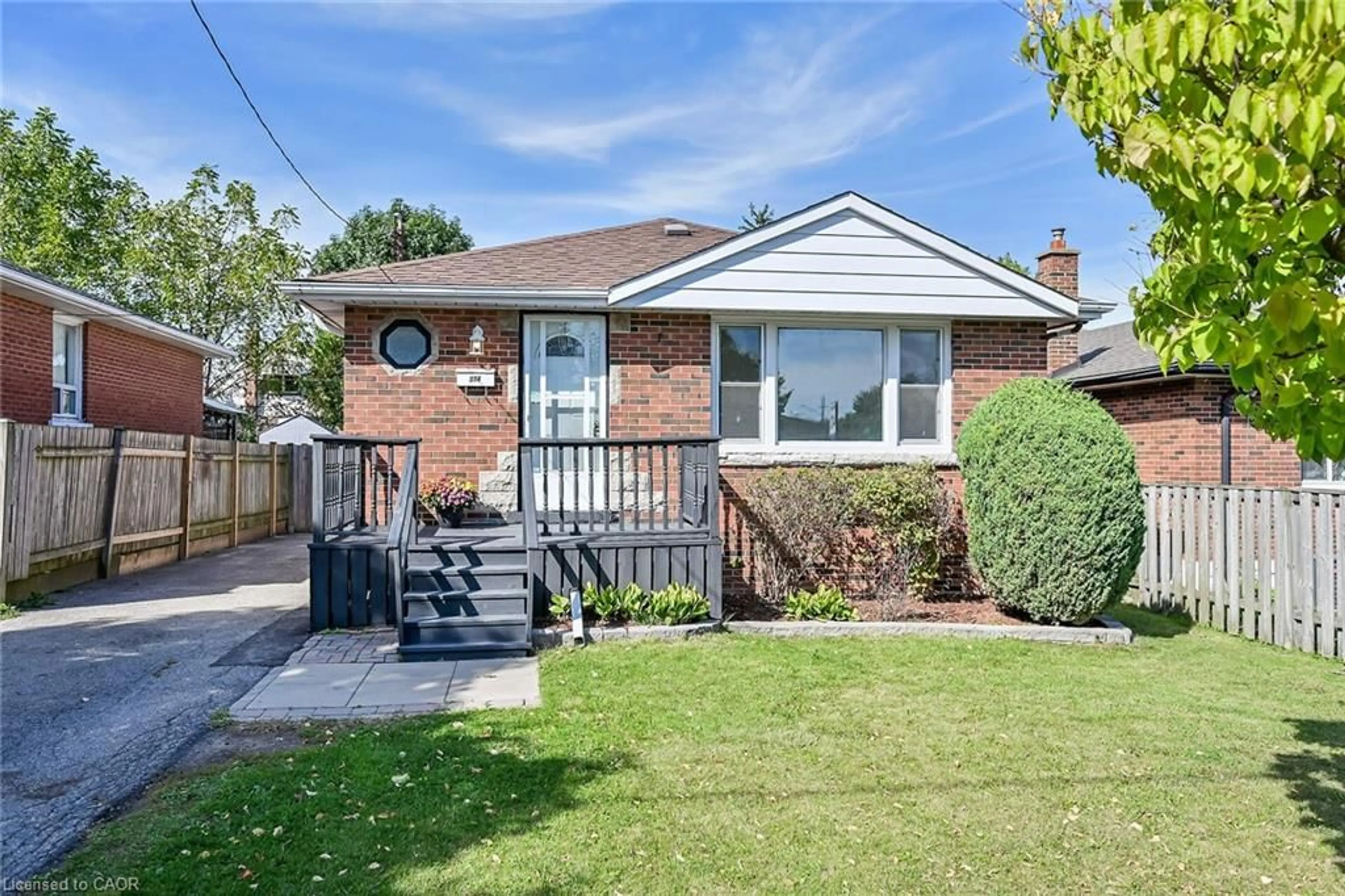 Home with brick exterior material, street for 314 East 16th St, Hamilton Ontario L9A 4J9