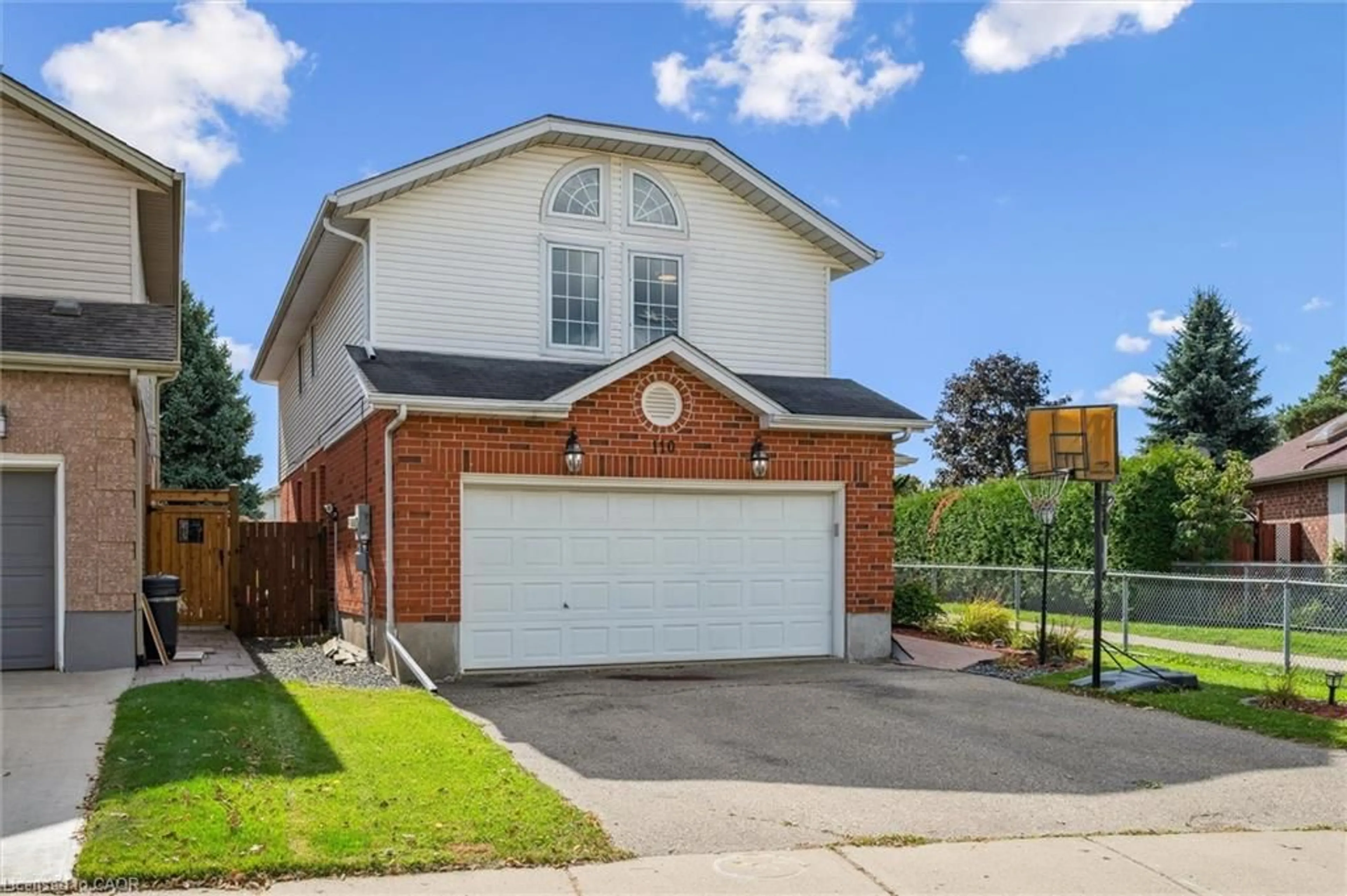 Home with brick exterior material, street for 110 Queen Charlotte Cres, Kitchener Ontario N2E 3N6