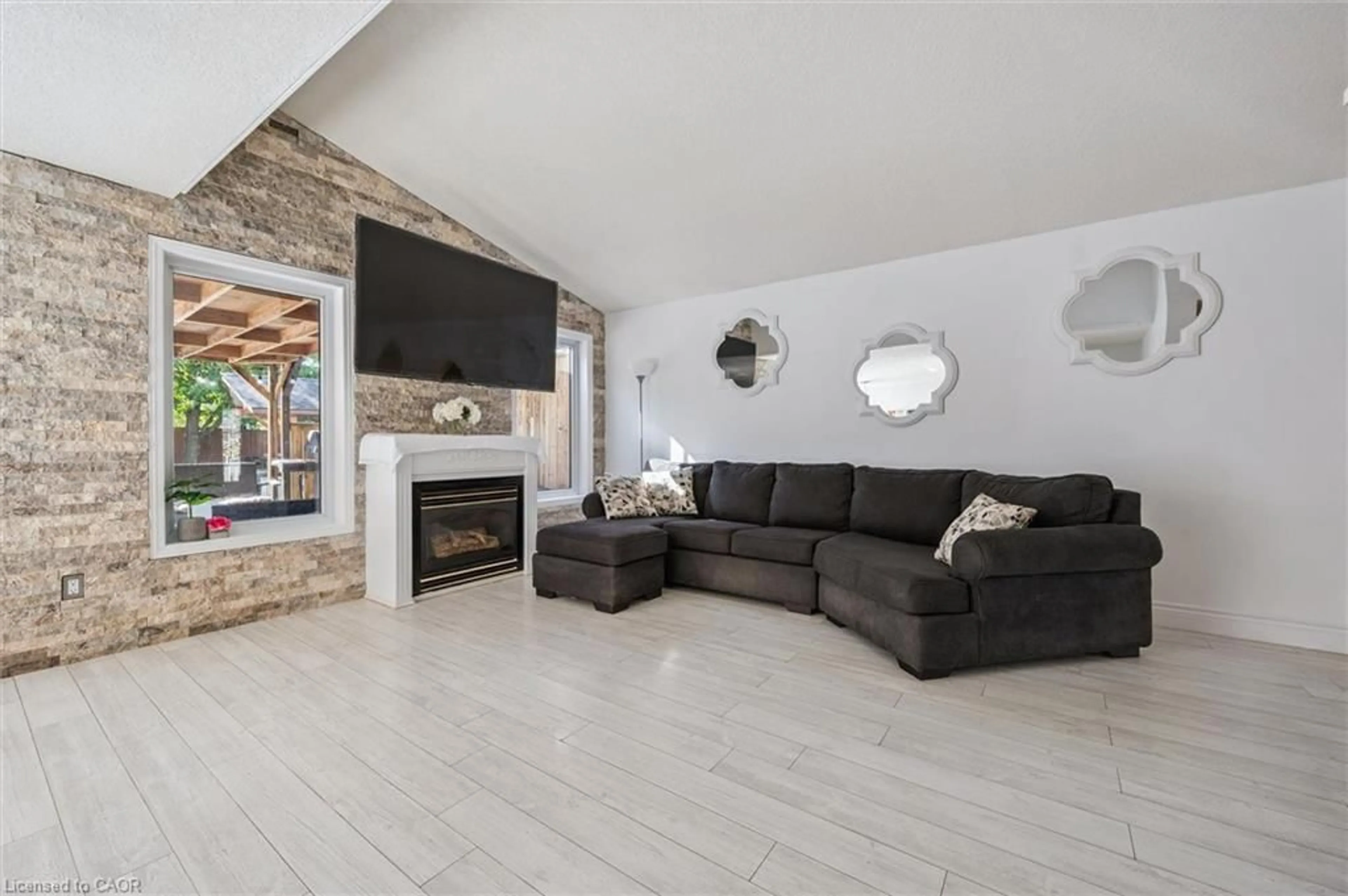 Living room with furniture, ceramic/tile floor for 110 Queen Charlotte Cres, Kitchener Ontario N2E 3N6