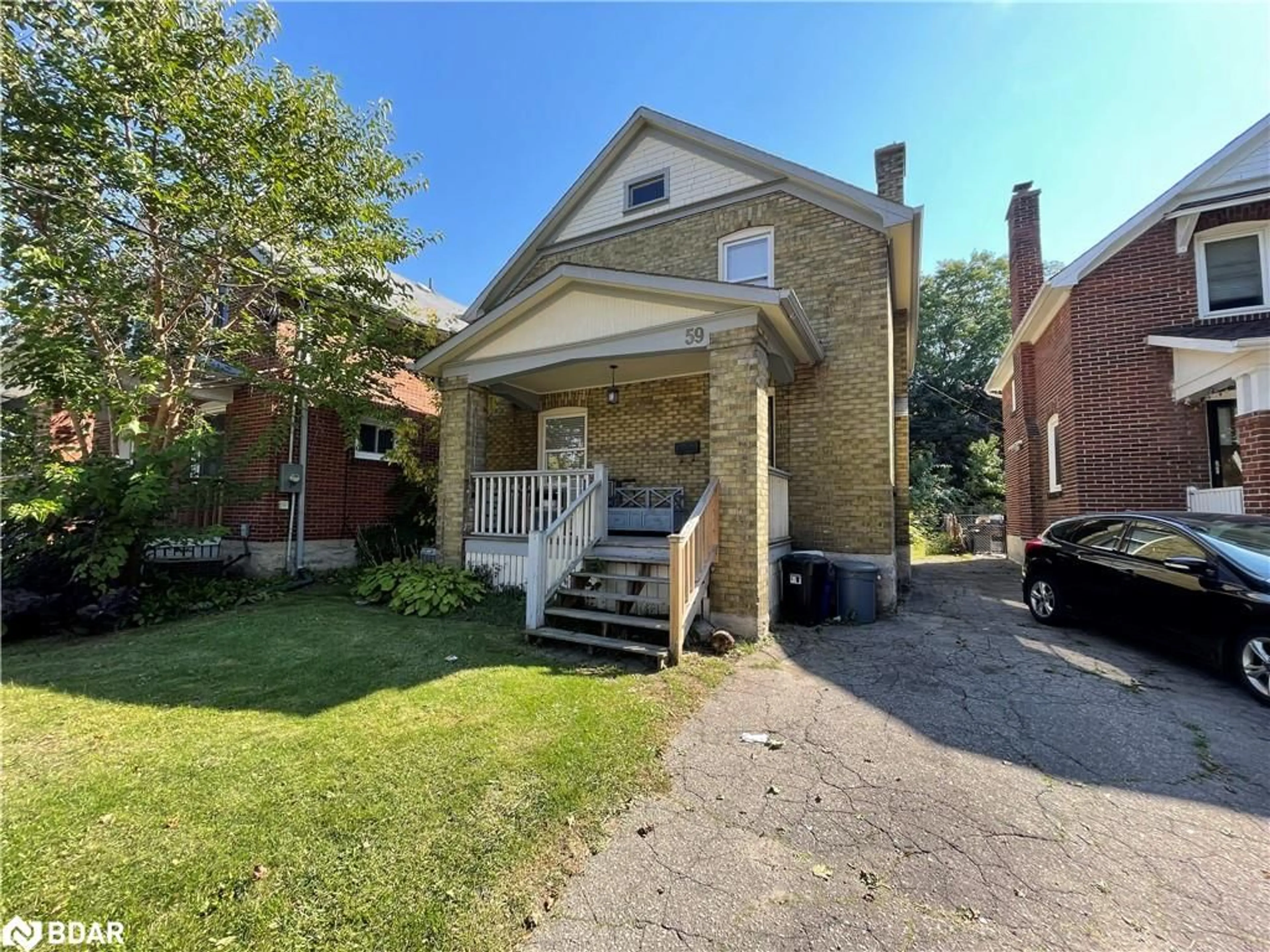 Home with brick exterior material, street for 59 Laurel St, Waterloo Ontario N2J 2H3