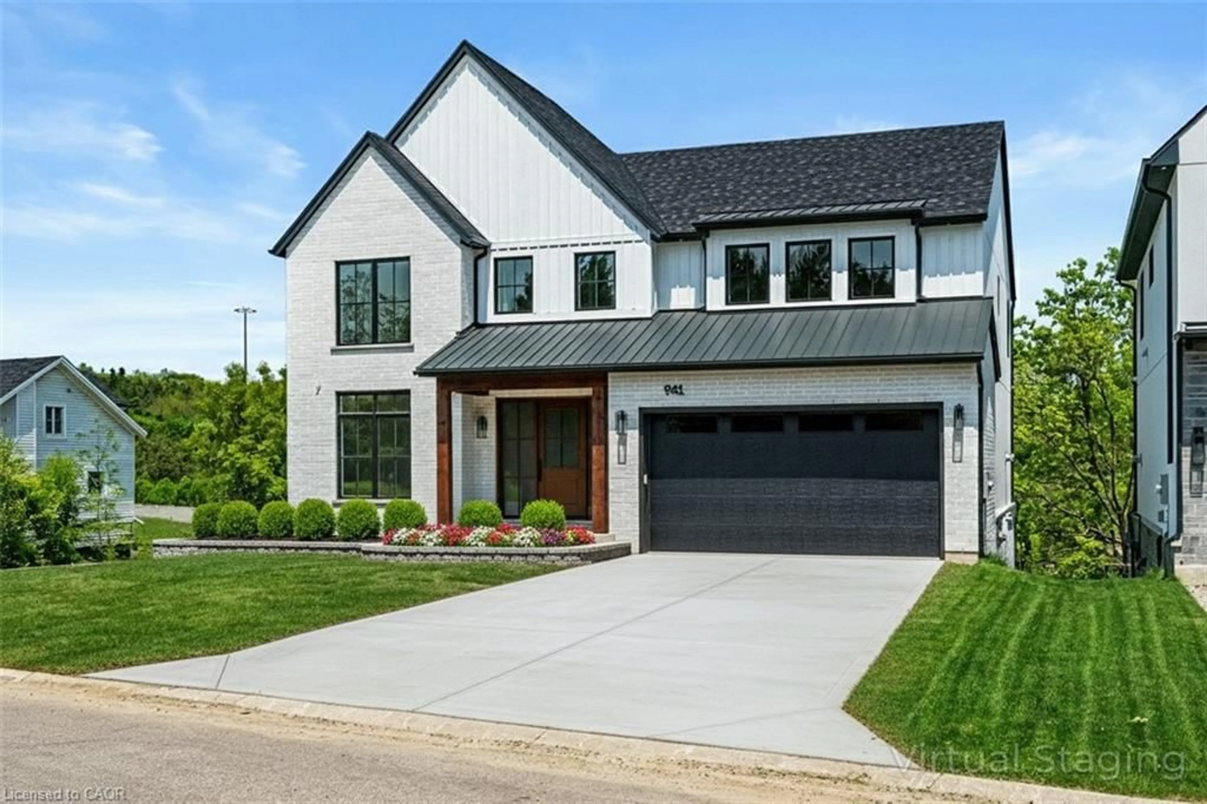 Home with brick exterior material, street for 941 Old Mohawk Rd, Ancaster Ontario L9G 3K9