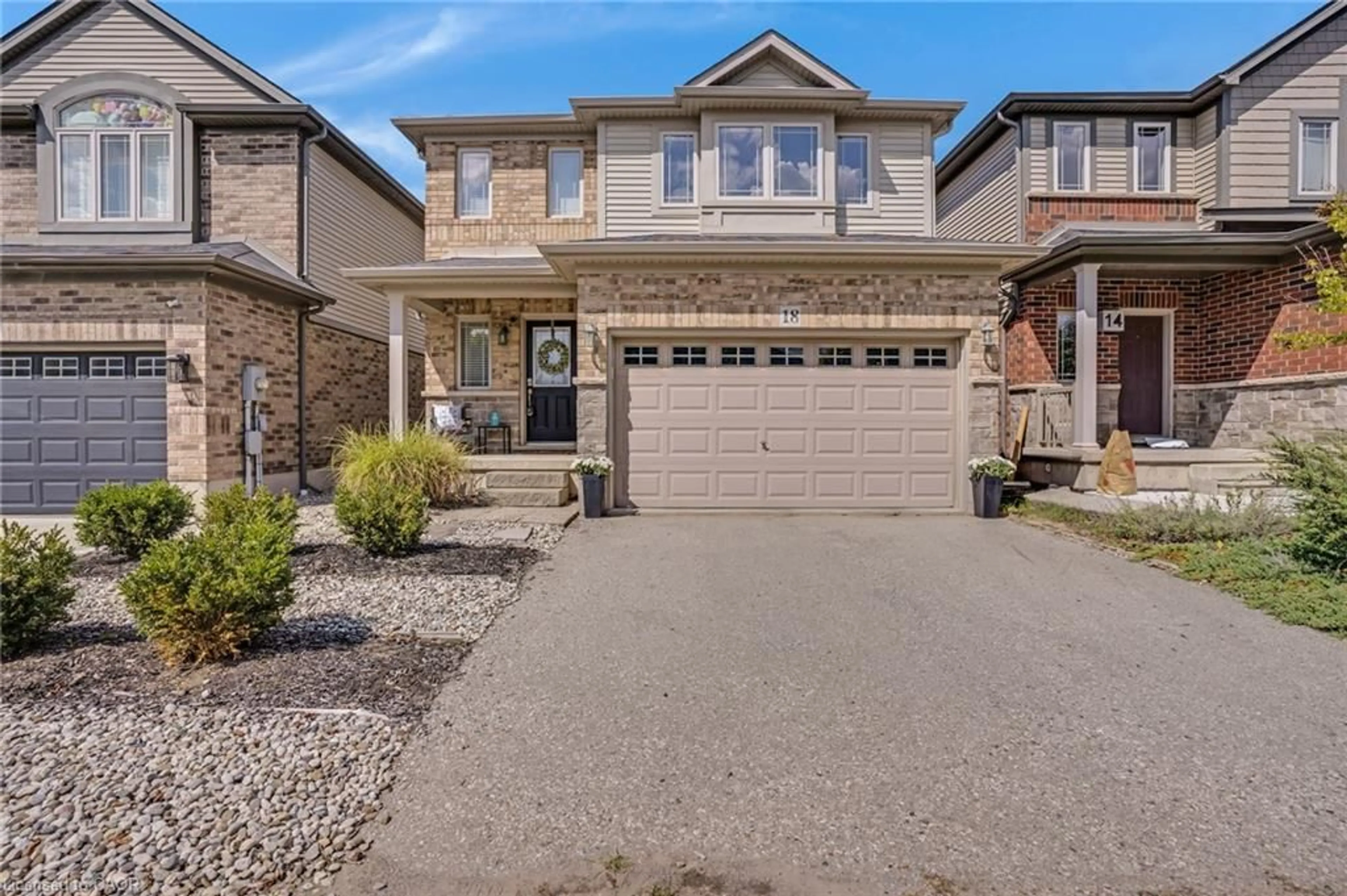 Home with brick exterior material, street for 18 Creek Ridge St, Kitchener Ontario N2R 0B5