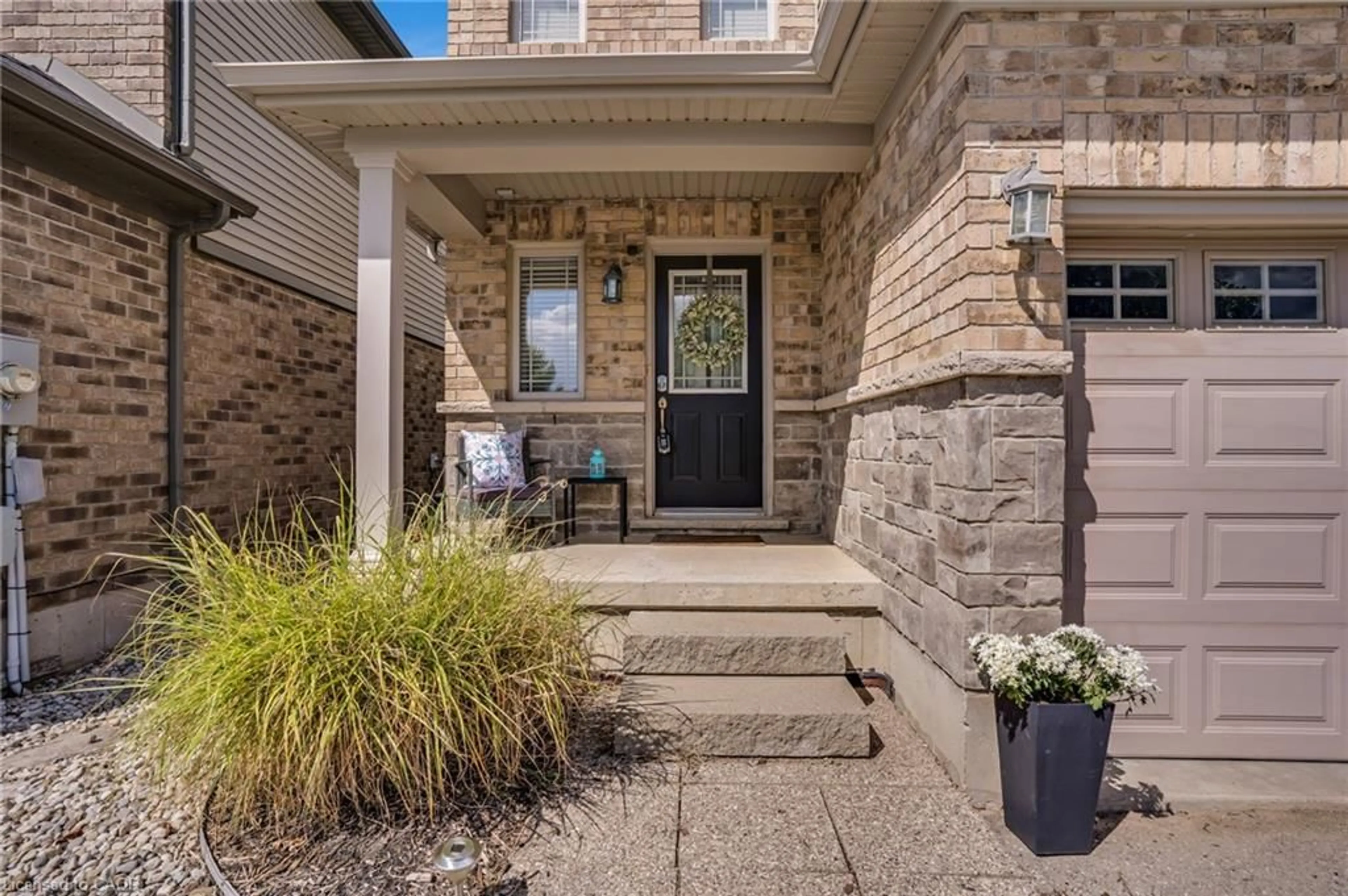 Home with brick exterior material, street for 18 Creek Ridge St, Kitchener Ontario N2R 0B5
