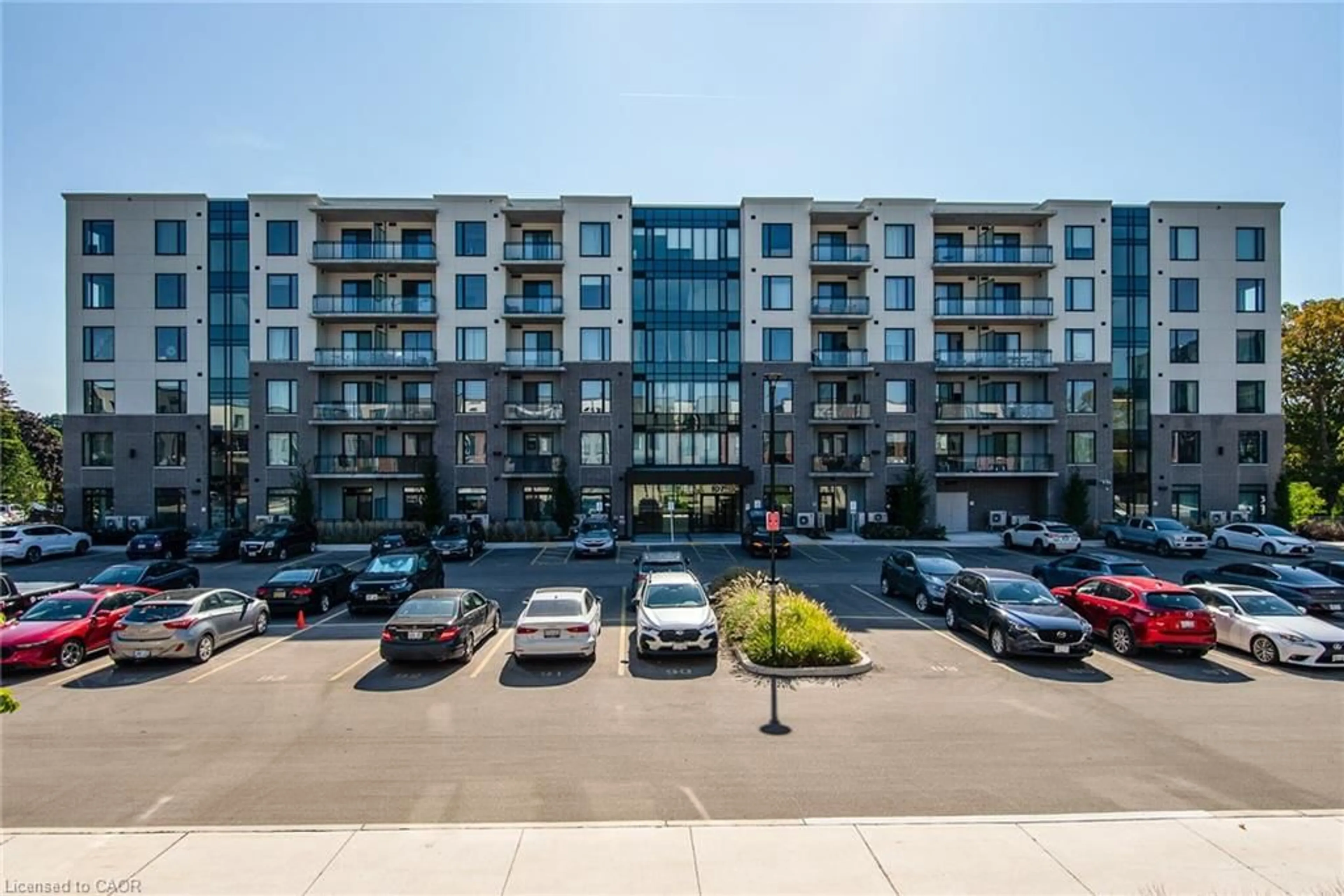 A pic from outside/outdoor area/front of a property/back of a property/a pic from drone, building for 107 Roger St #414, Waterloo Ontario N2J 0G3