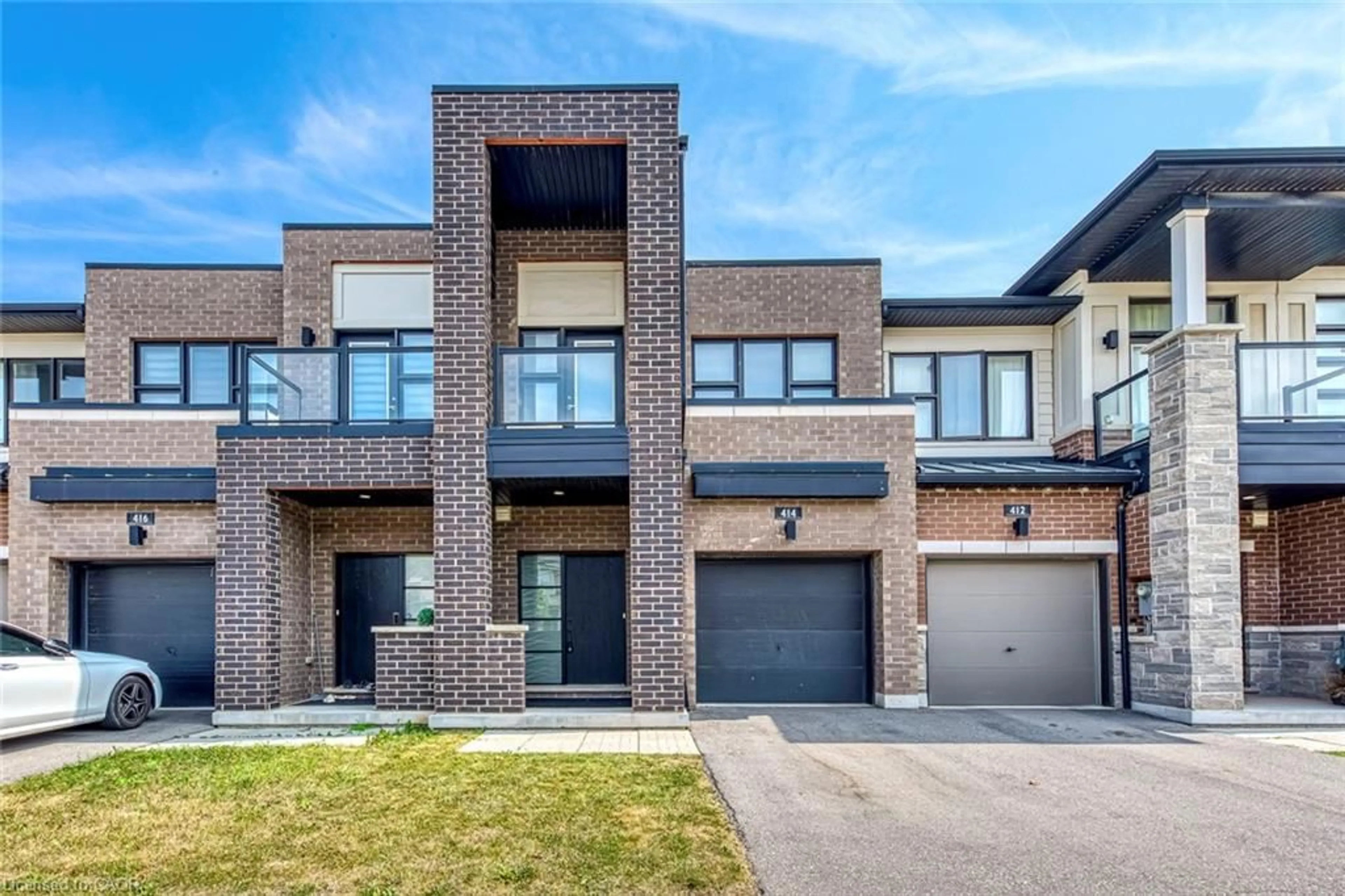 Home with brick exterior material, street for 414 Wheat Boom Dr, Oakville Ontario L6H 0R4