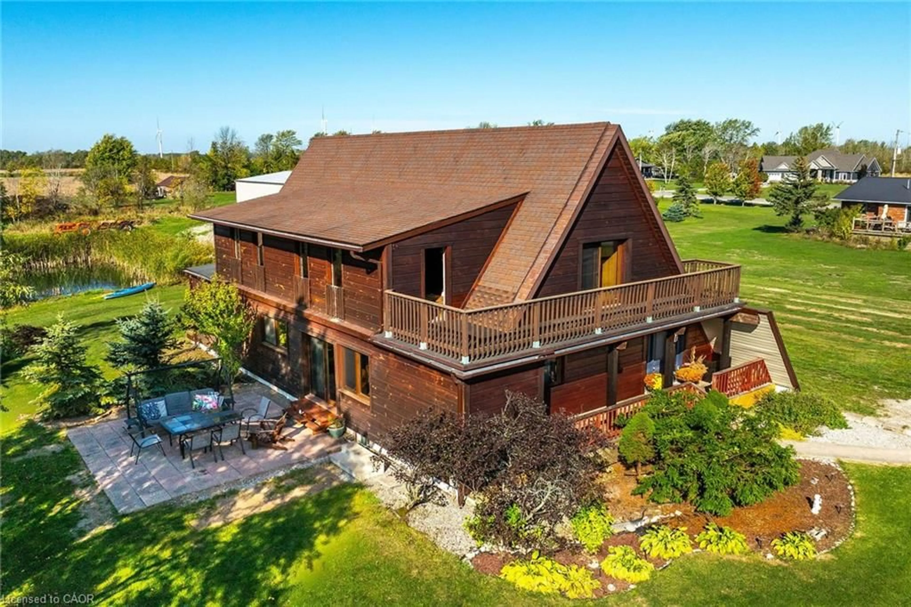 A pic from outside/outdoor area/front of a property/back of a property/a pic from drone, water/lake/river/ocean view for 10 Kimber Rd, Lowbanks Ontario N0A 1K0