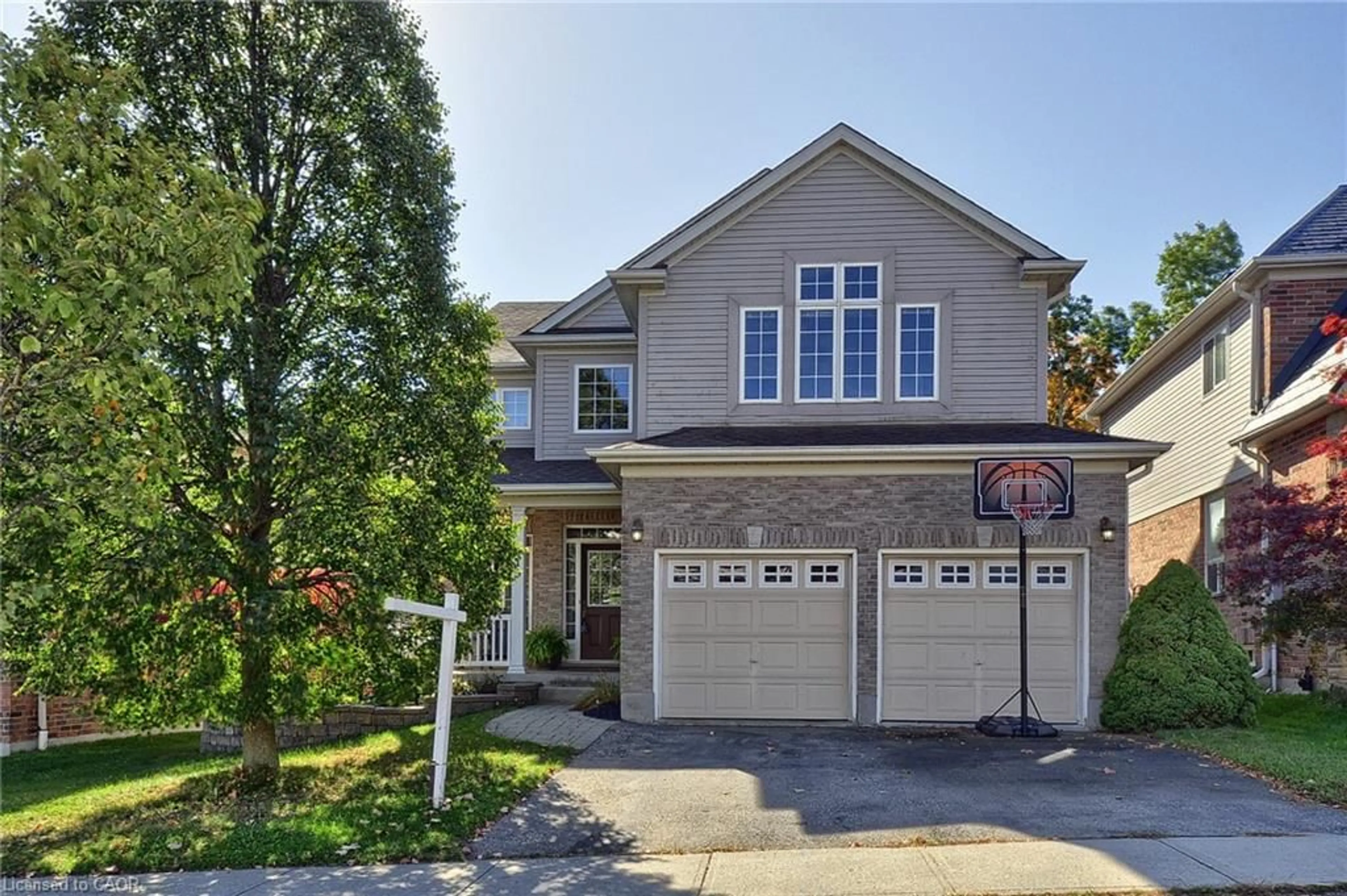 Home with brick exterior material, street for 313 Pine Valley Dr, Kitchener Ontario N2P 2V5