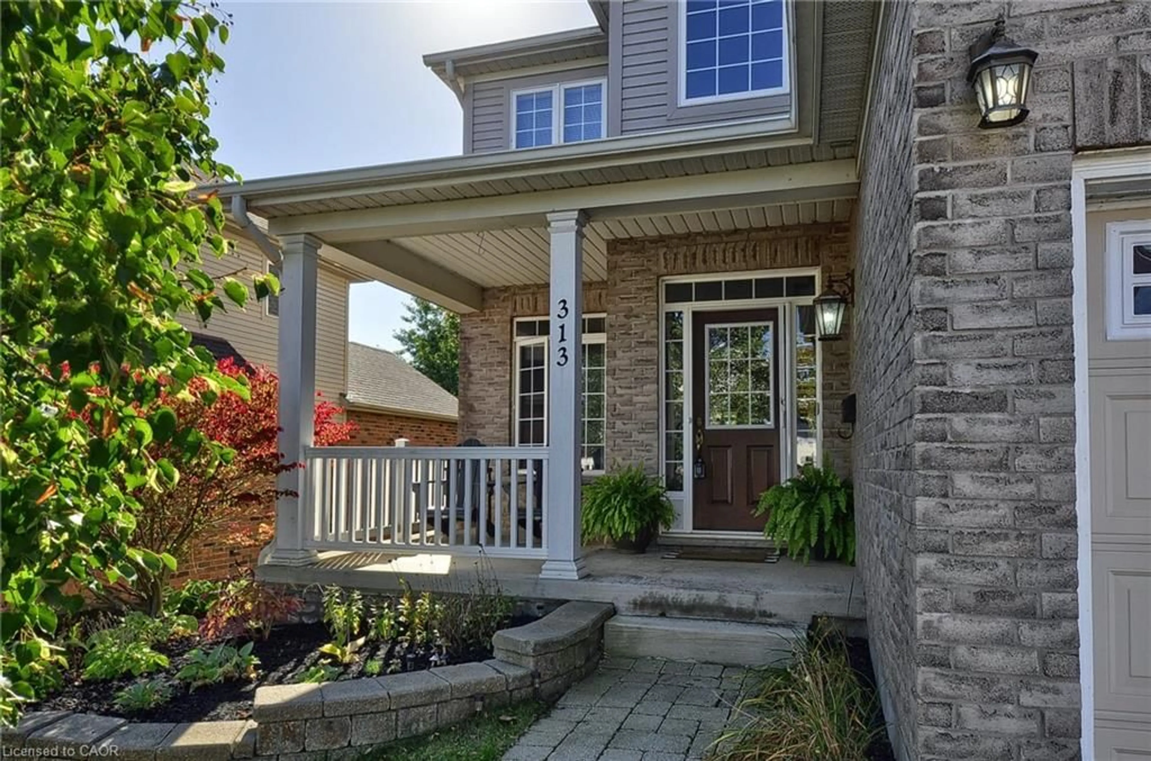 Home with brick exterior material, street for 313 Pine Valley Dr, Kitchener Ontario N2P 2V5