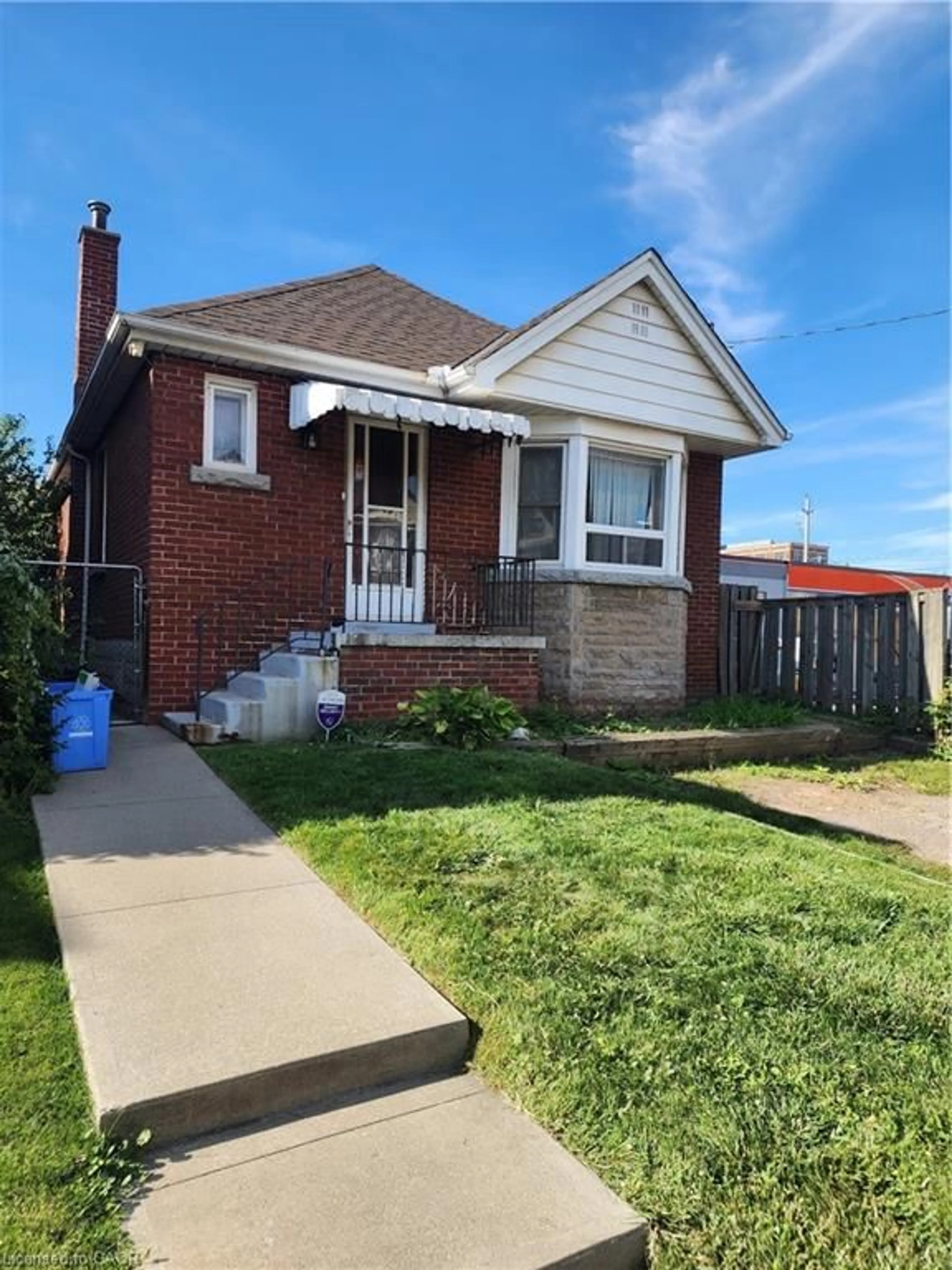 Home with brick exterior material, street for 199 Stirton St, Hamilton Ontario L8L 6G7