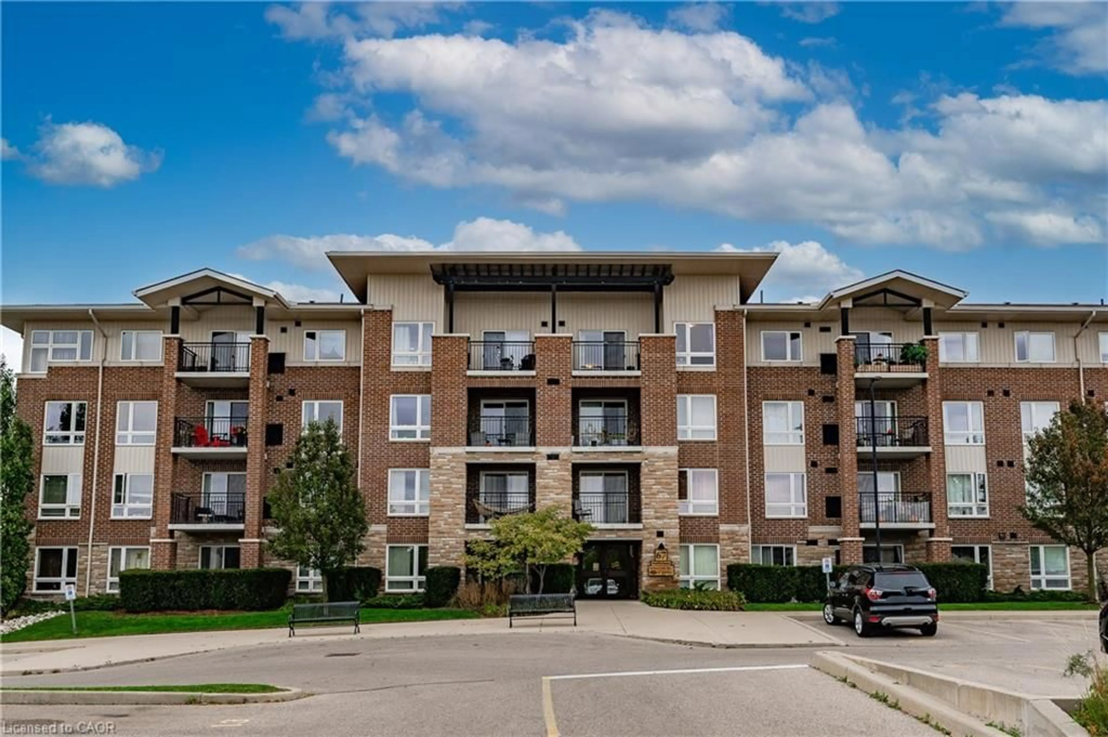 A pic from outside/outdoor area/front of a property/back of a property/a pic from drone, building for 67 Kingsbury Sq #411, Guelph Ontario N1L 0L3