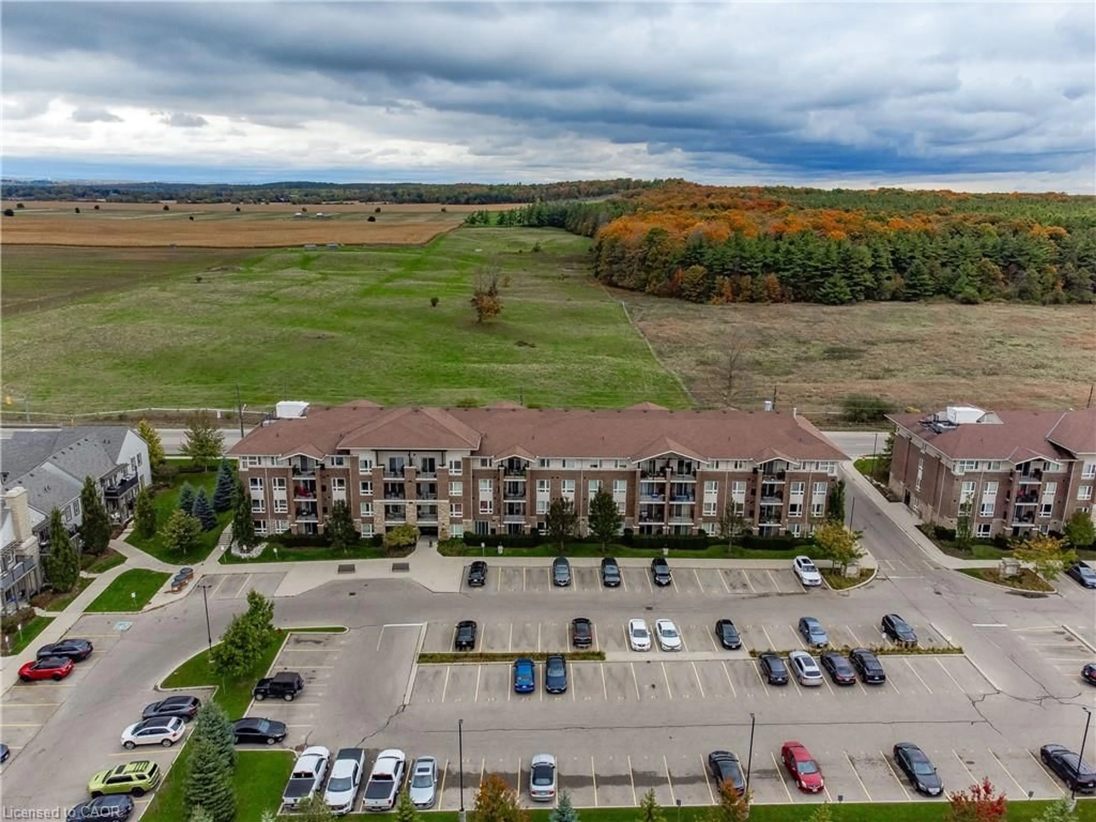 A pic from outside/outdoor area/front of a property/back of a property/a pic from drone, mountain view for 67 Kingsbury Sq #411, Guelph Ontario N1L 0L3