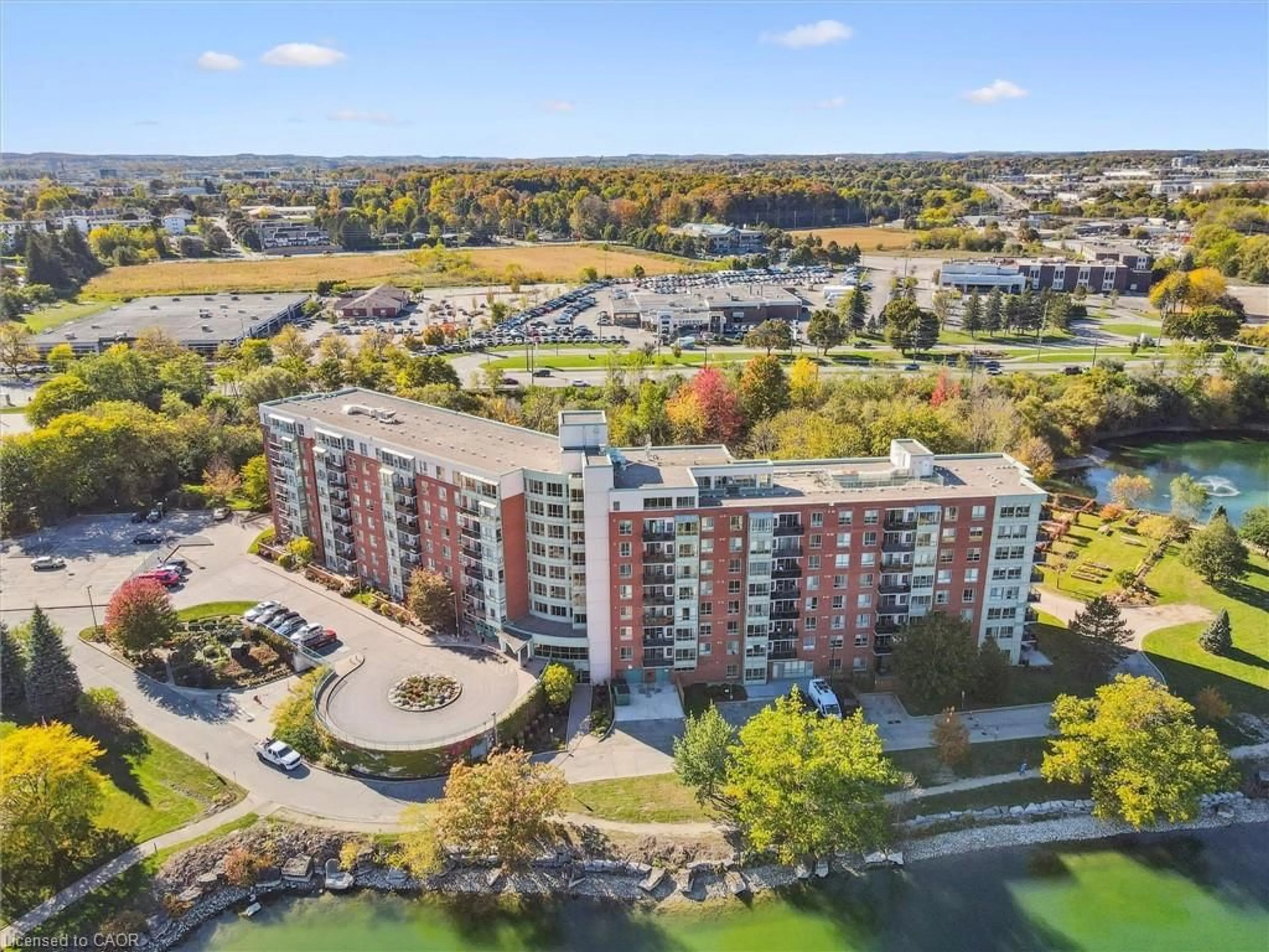 A pic from outside/outdoor area/front of a property/back of a property/a pic from drone, water/lake/river/ocean view for 30 Blue Springs Dr #702, Waterloo Ontario N2J 4T2