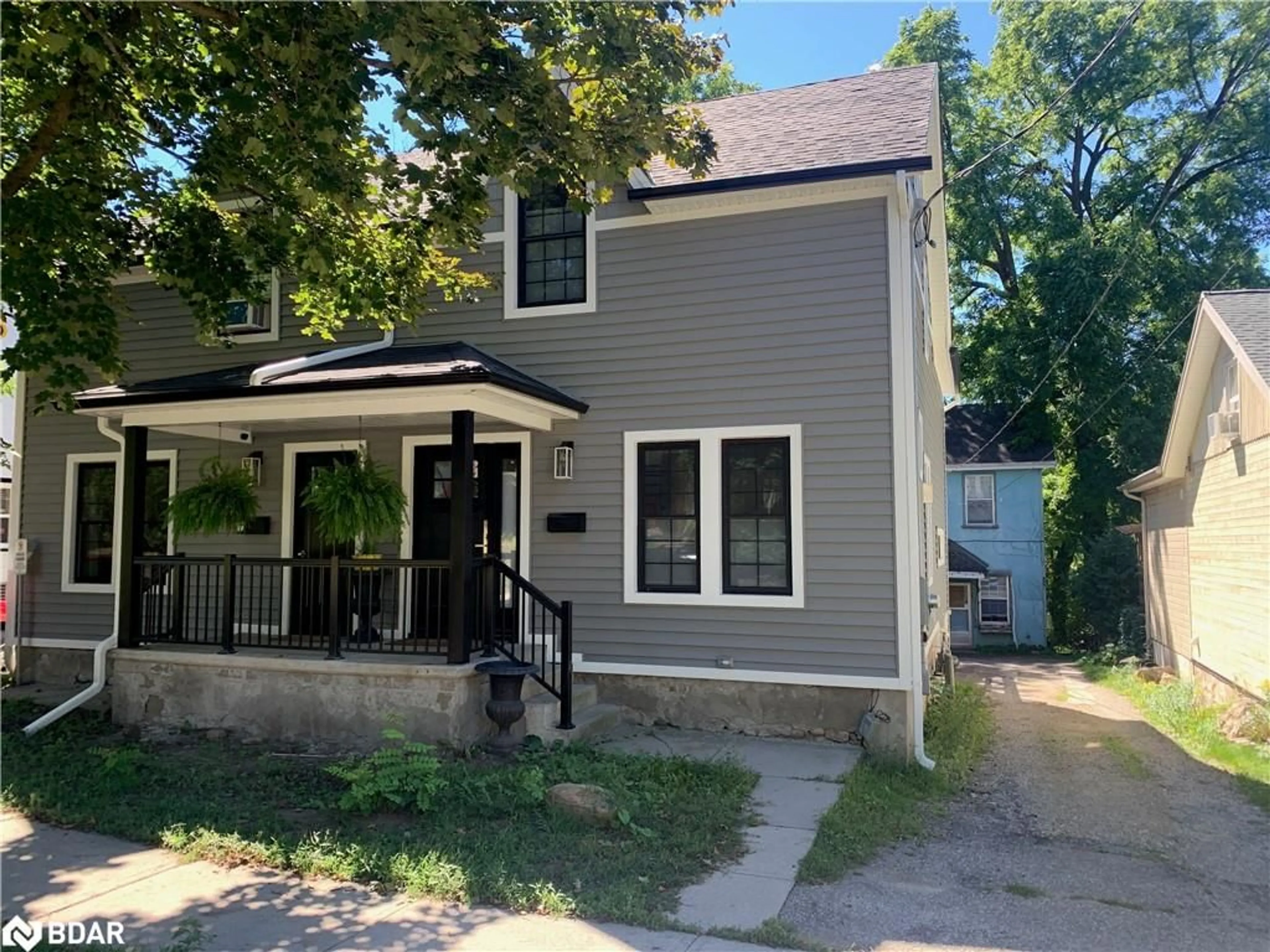Home with vinyl exterior material, street for 114-116 Arthur St, Guelph Ontario N1E 4V2