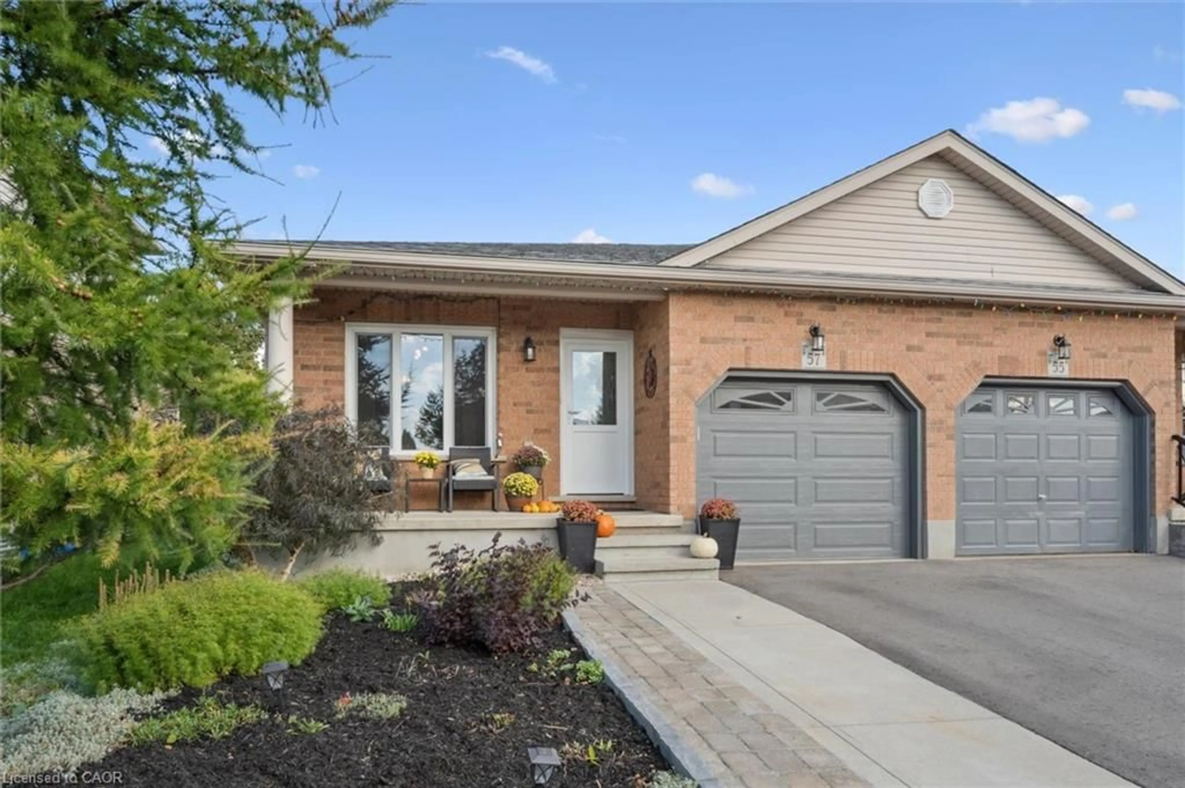 Home with brick exterior material, street for 57 Muscovey Dr, Elmira Ontario N3B 3M6