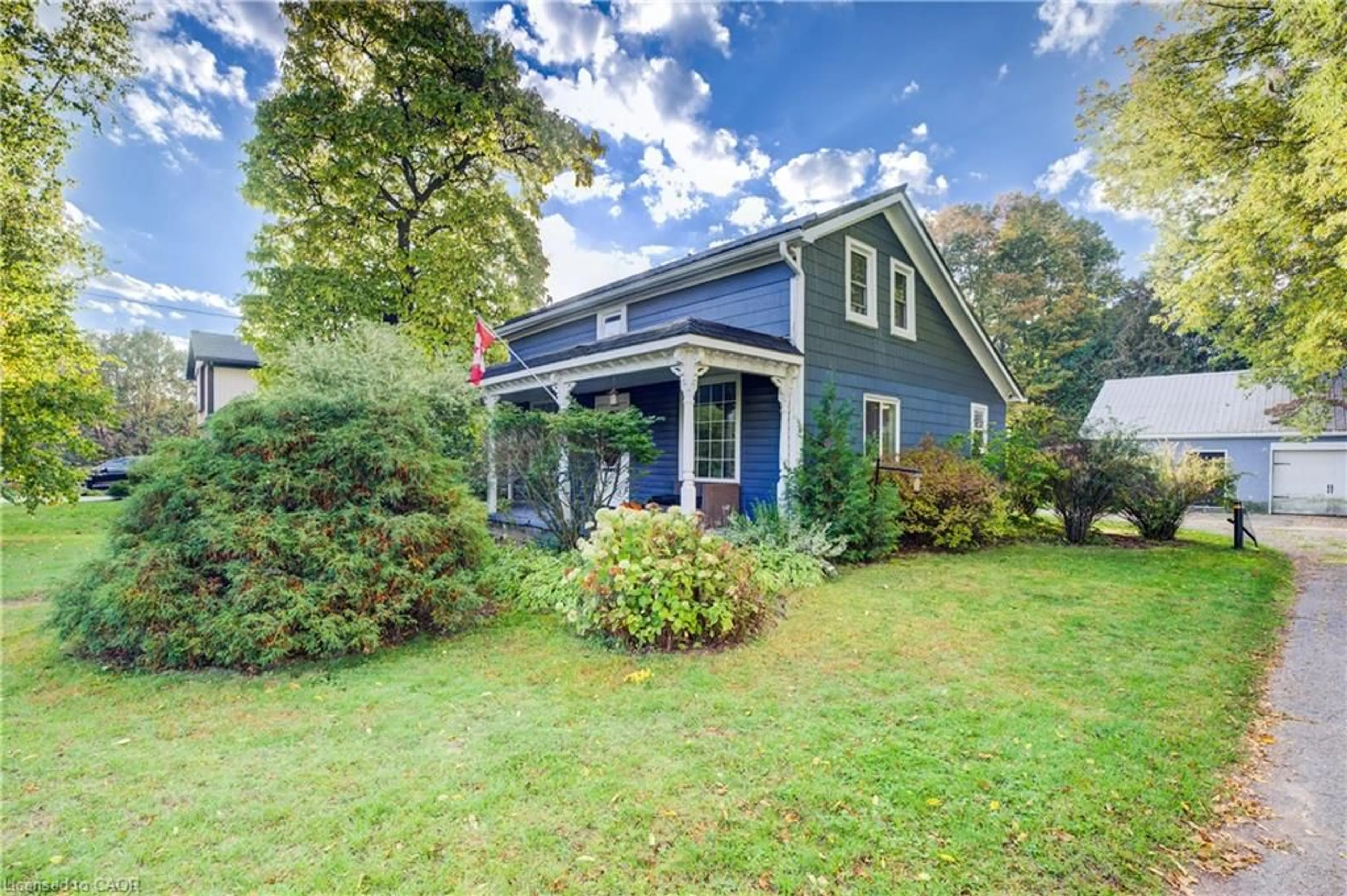 Home with vinyl exterior material, street for 307 Main Street St, Otterville Ontario N0J 1R0