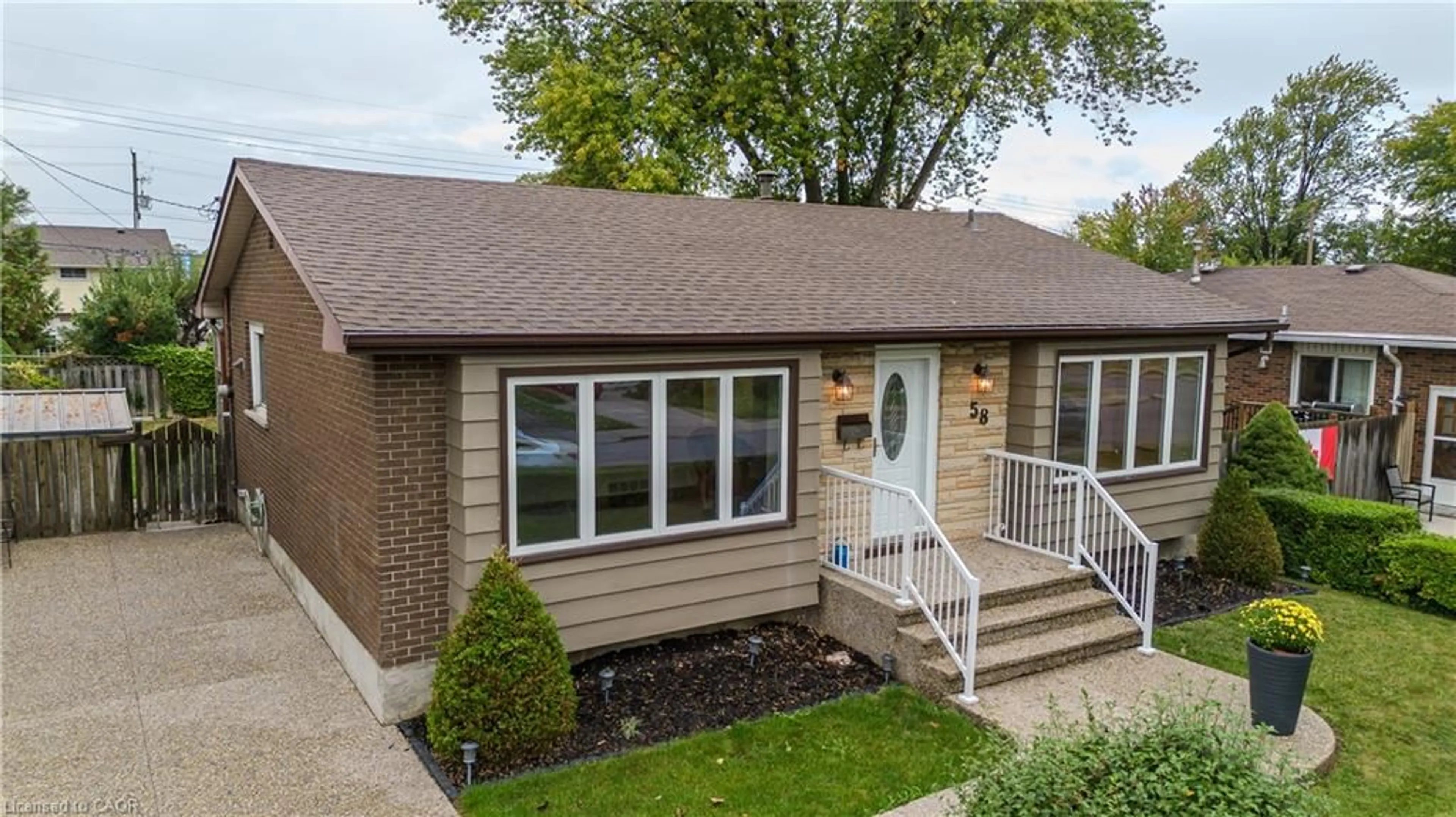 Home with brick exterior material, street for 58 Goldfinch Rd, Hamilton Ontario L9A 3W7
