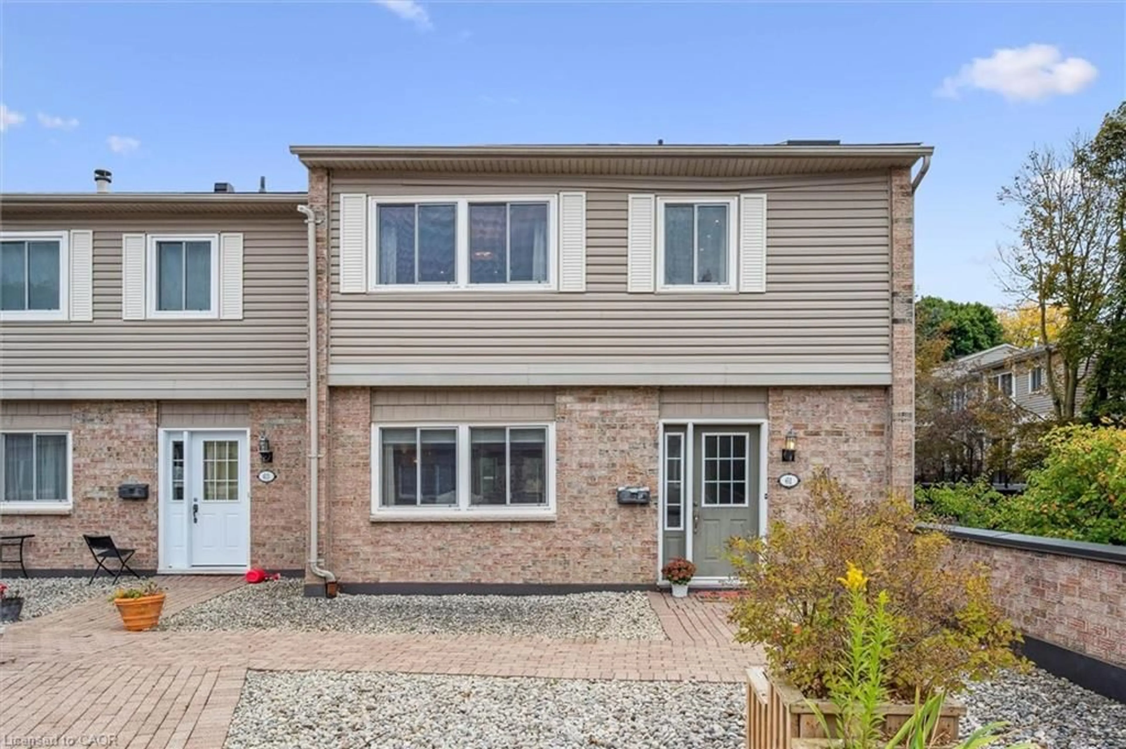 Home with brick exterior material, street for 295 Water St #61, Guelph Ontario N1G 2X5