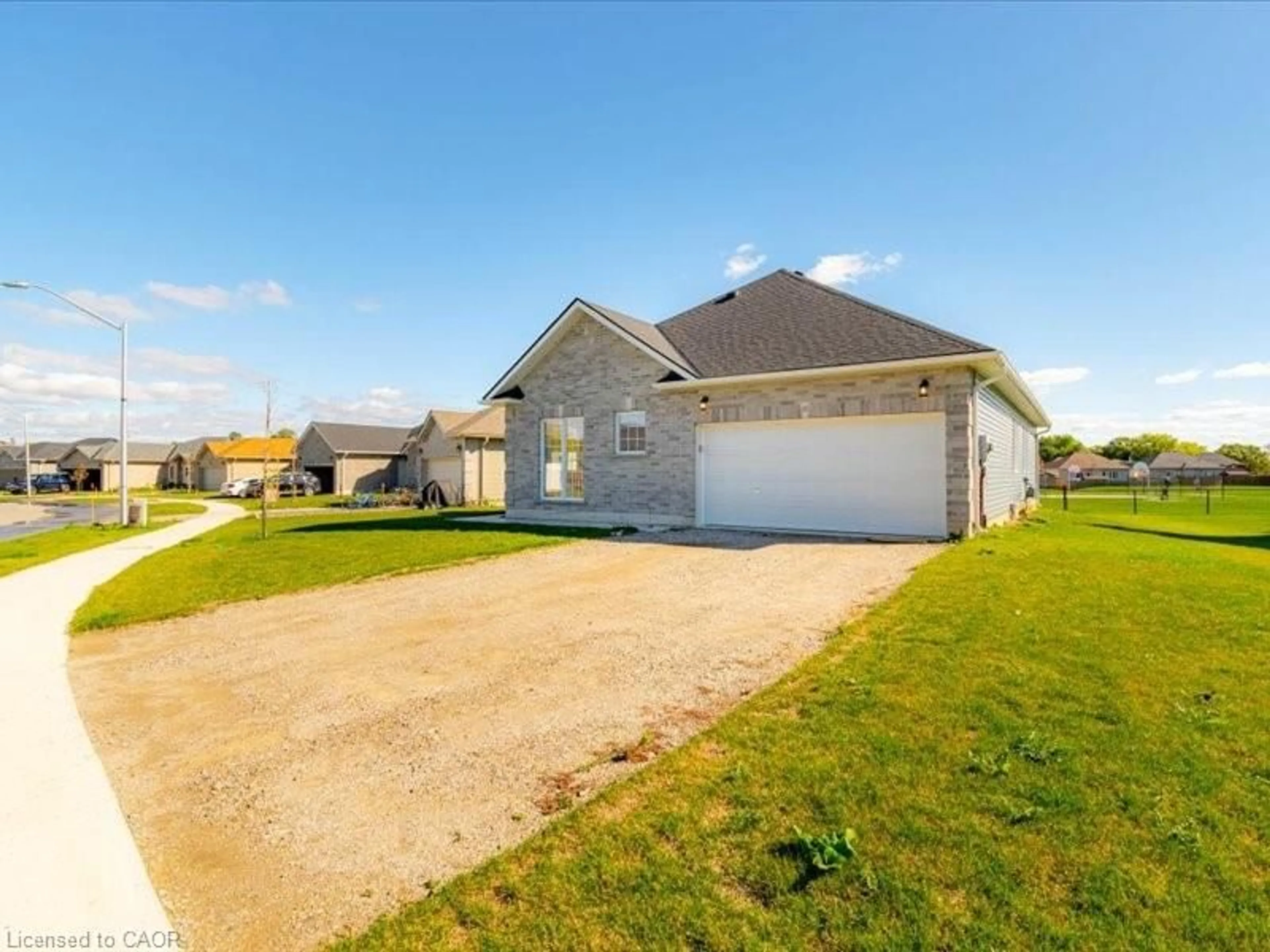 A pic from outside/outdoor area/front of a property/back of a property/a pic from drone, street for 110 Delong Drive Dr, Norwich Ontario N0J 1P0