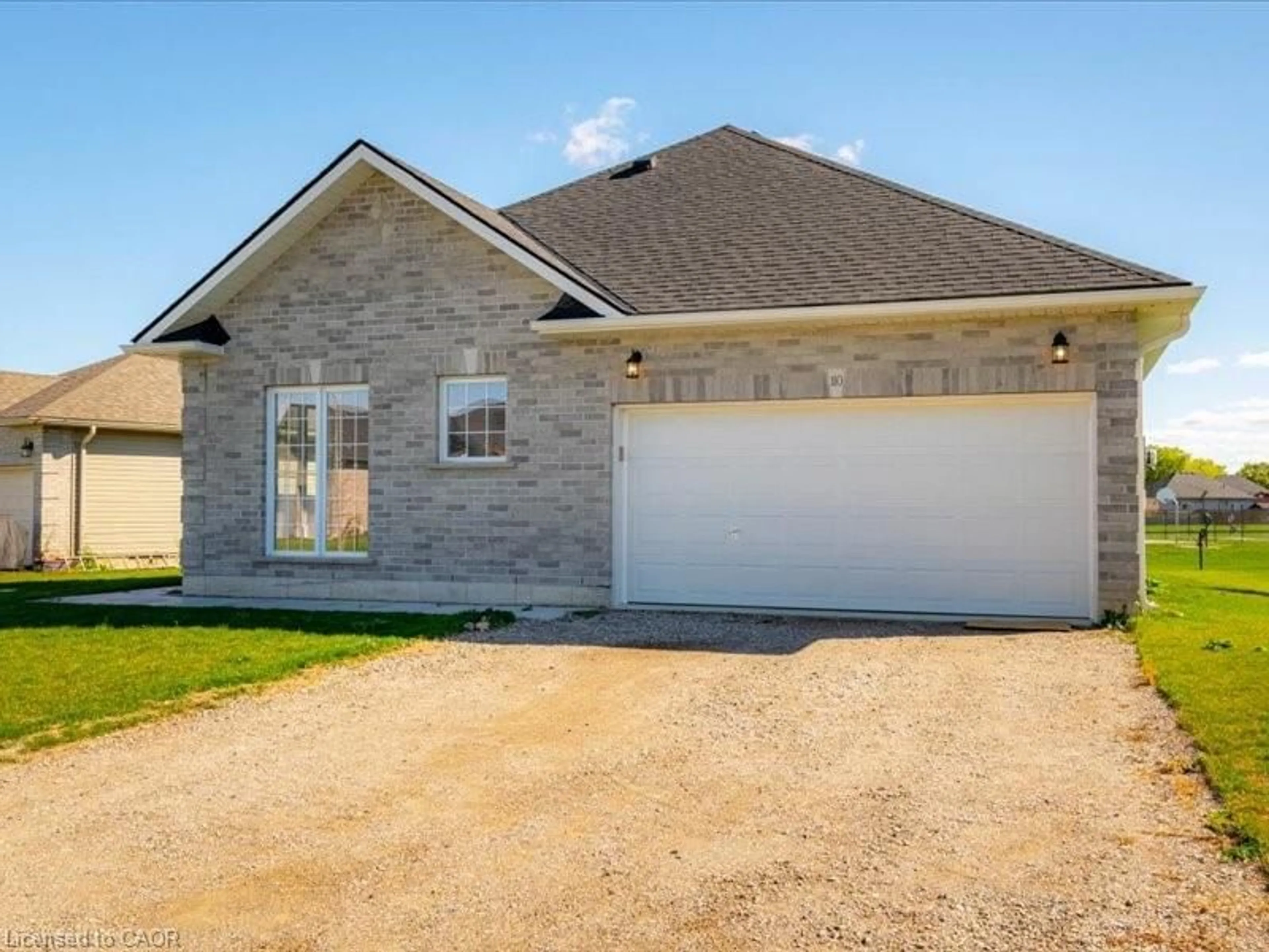 Home with brick exterior material, street for 110 Delong Drive Dr, Norwich Ontario N0J 1P0