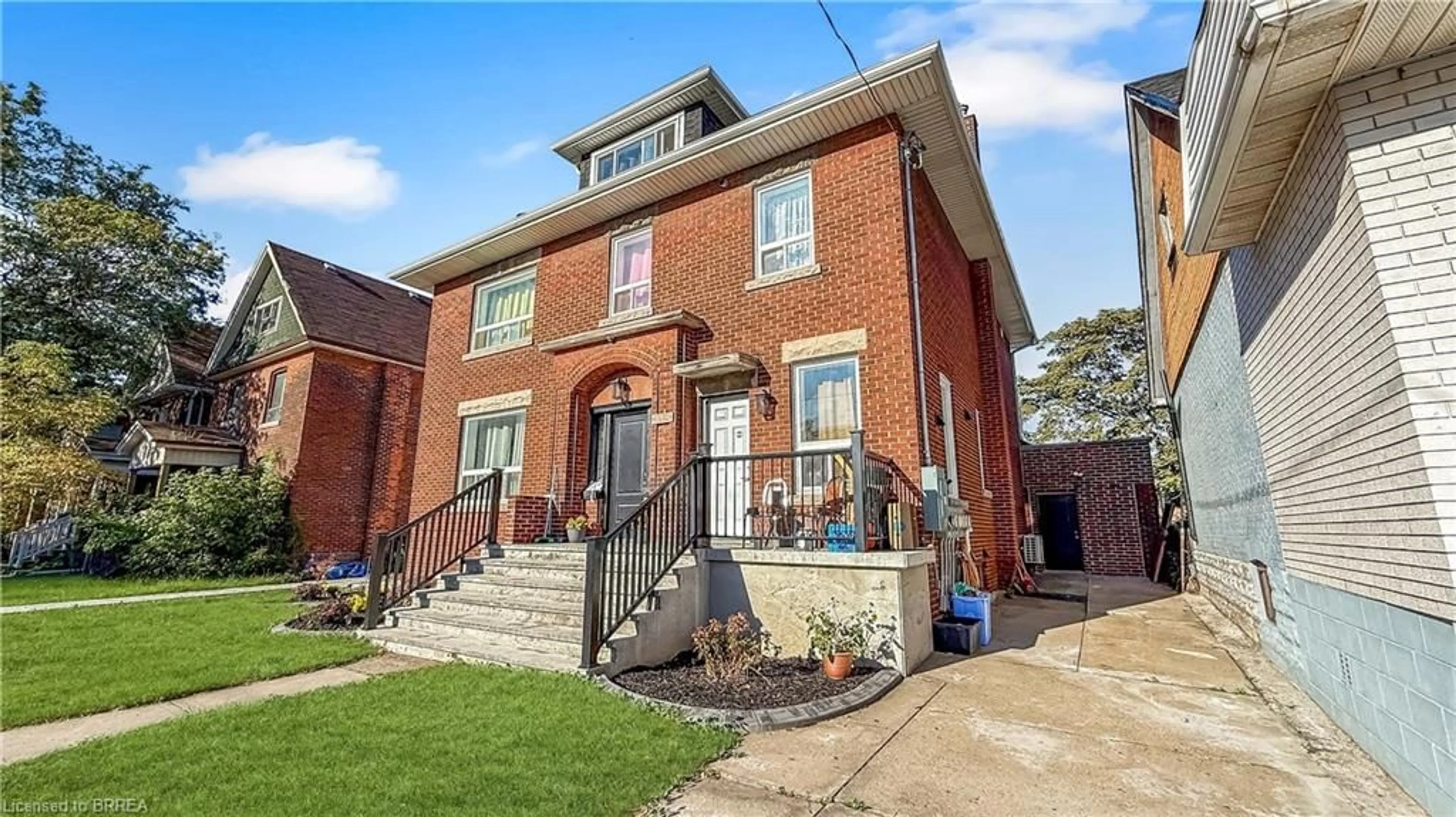 Home with brick exterior material, street for 119 Ottawa St, Hamilton Ontario L8H 3Y9