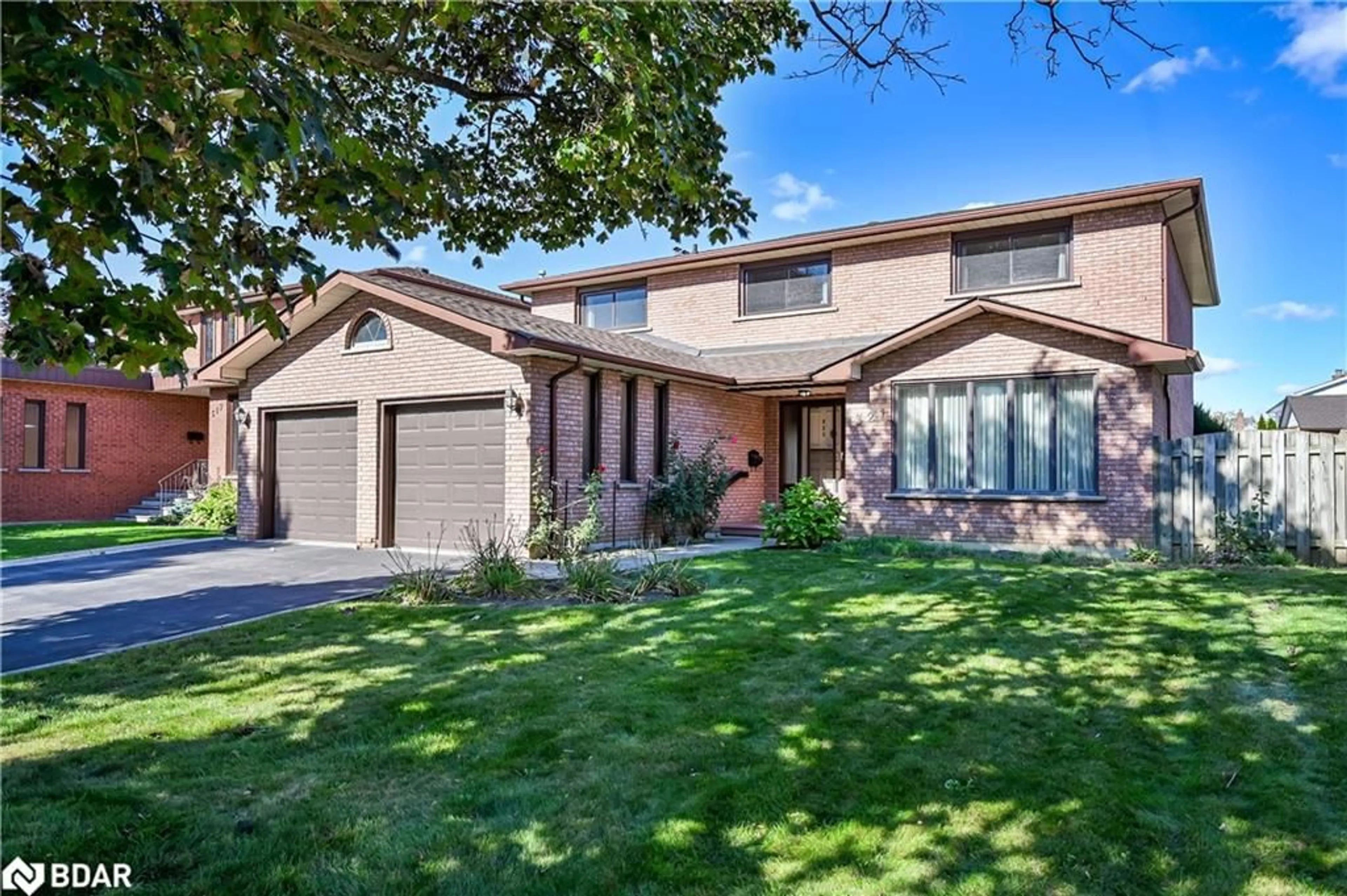 Home with brick exterior material, street for 321 Creelman Rd, Mississauga Ontario L5A 4A6