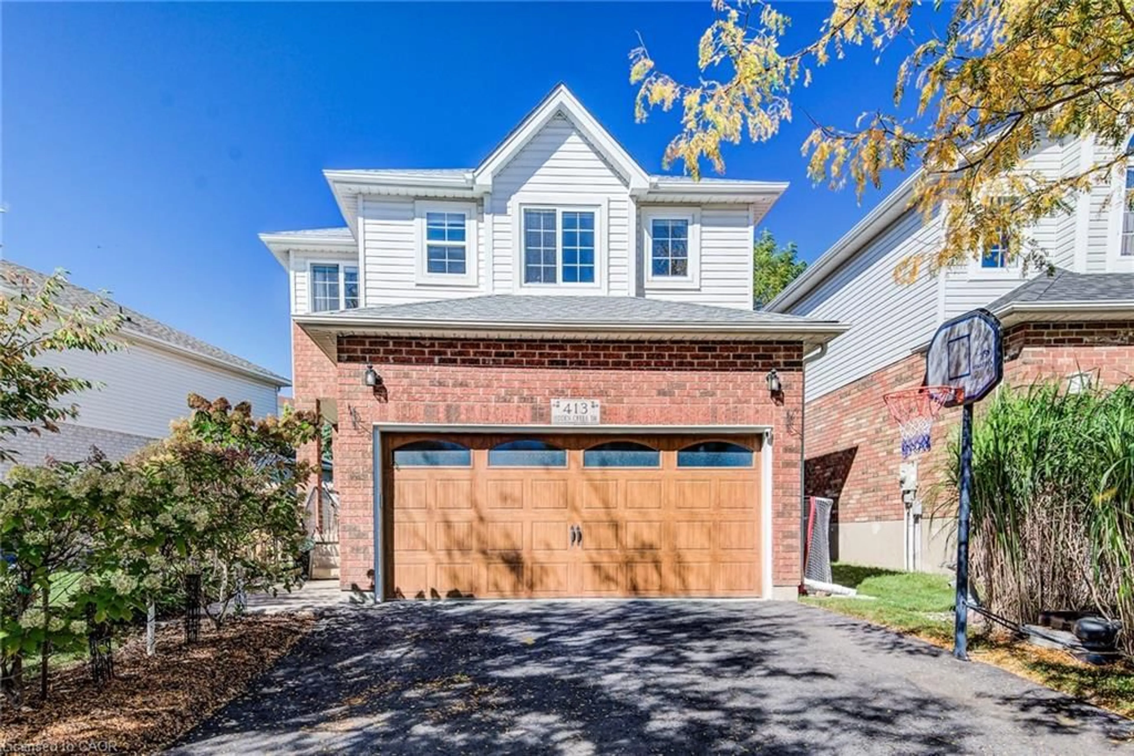 Home with brick exterior material, street for 413 Hidden Creek Dr, Kitchener Ontario N2N 3N2