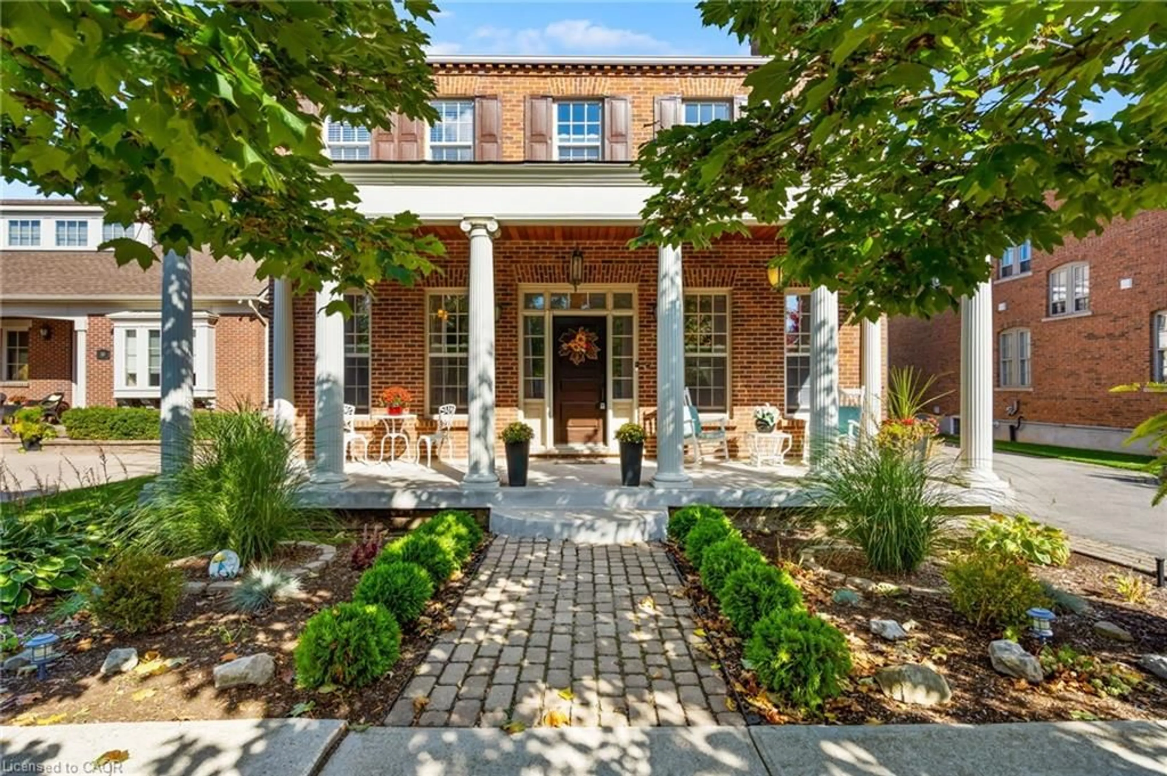 Home with brick exterior material, street for 52 Garrison Village Dr, Niagara-on-the-Lake Ontario L0S 1J0