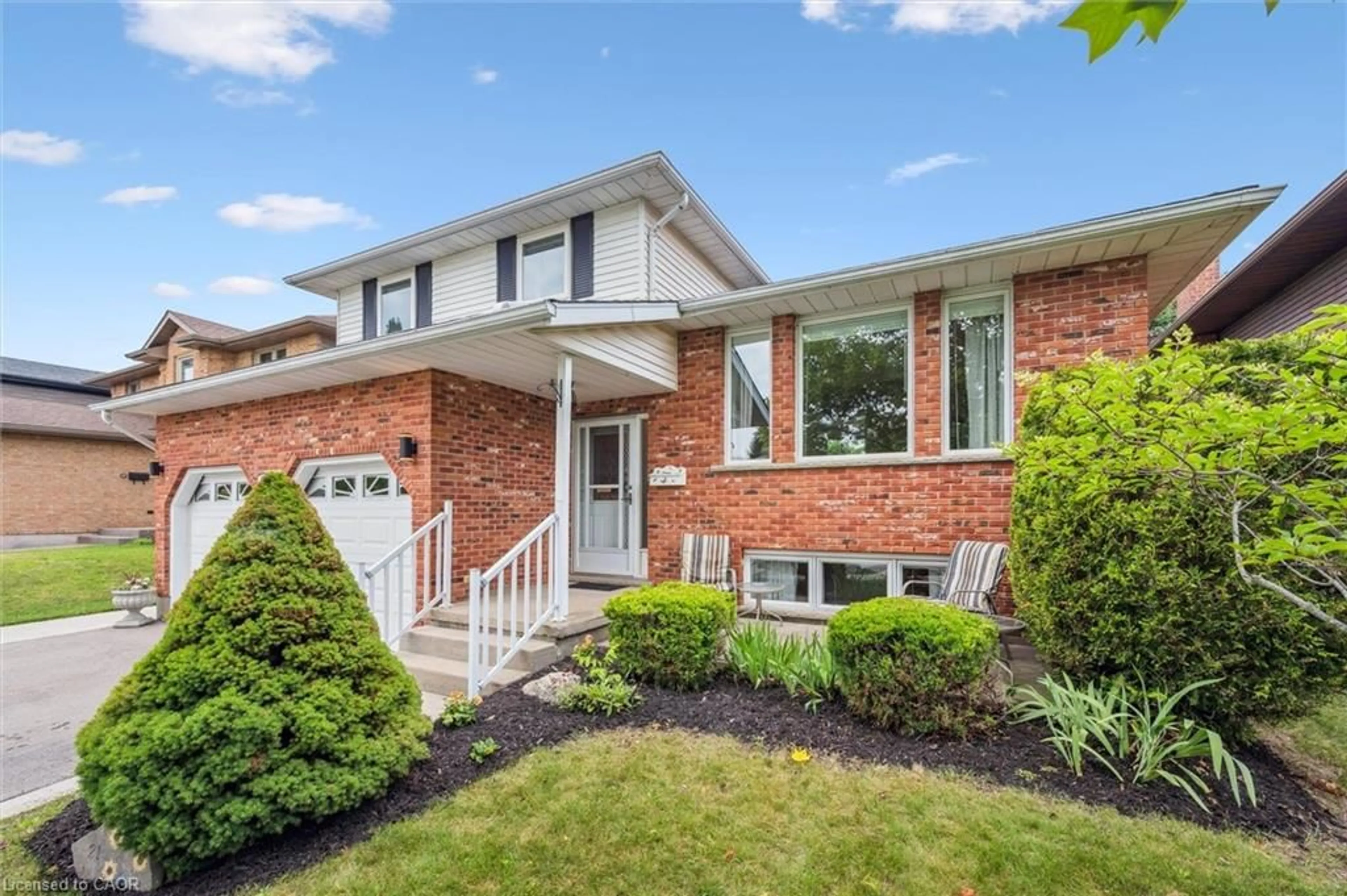 Home with brick exterior material, street for 21 Old Colony Trail, Guelph Ontario N1G 4A3