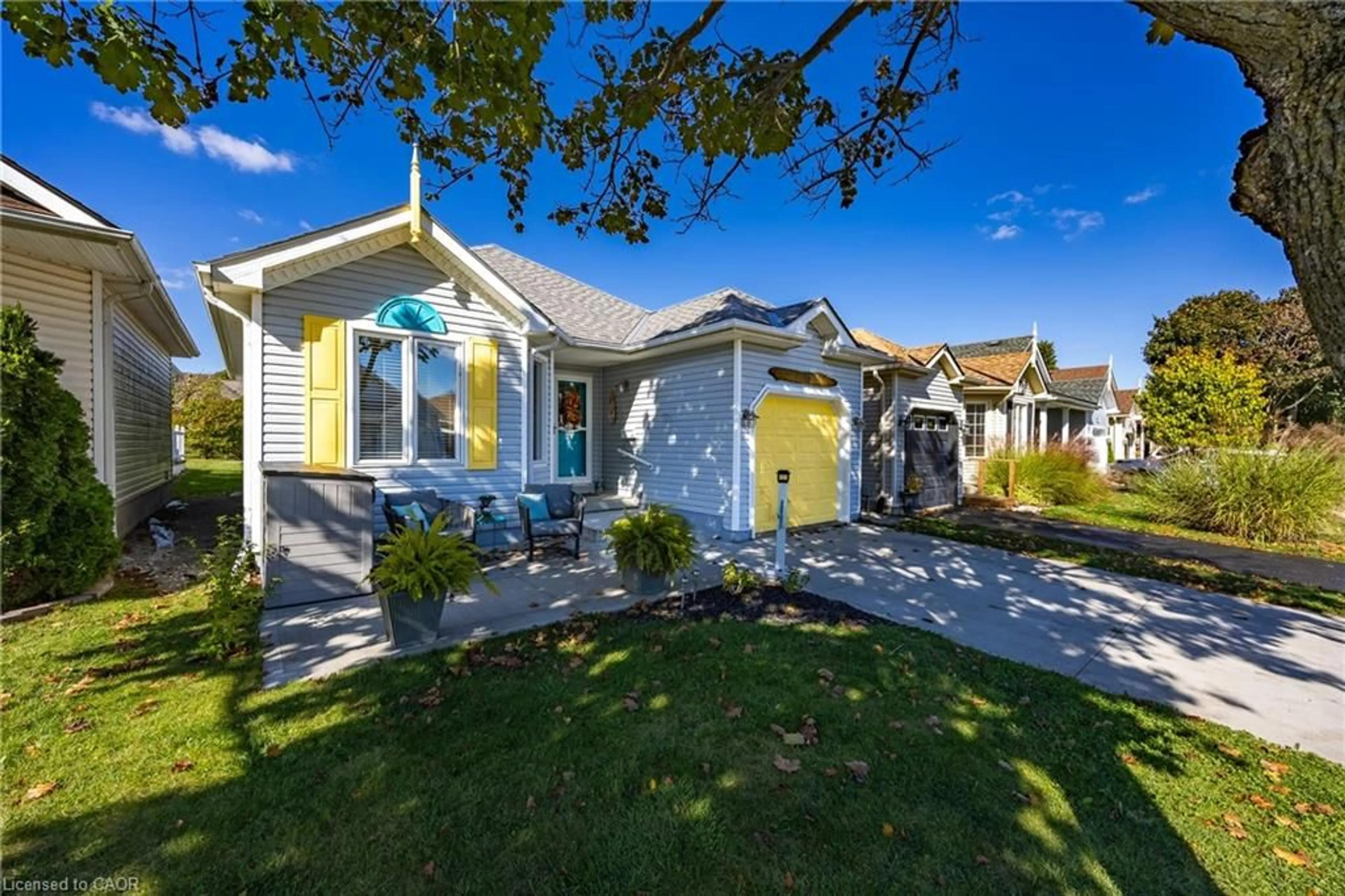 Home with vinyl exterior material, street for 18 Long Point Blvd, Port Rowan Ontario N0E 1M0