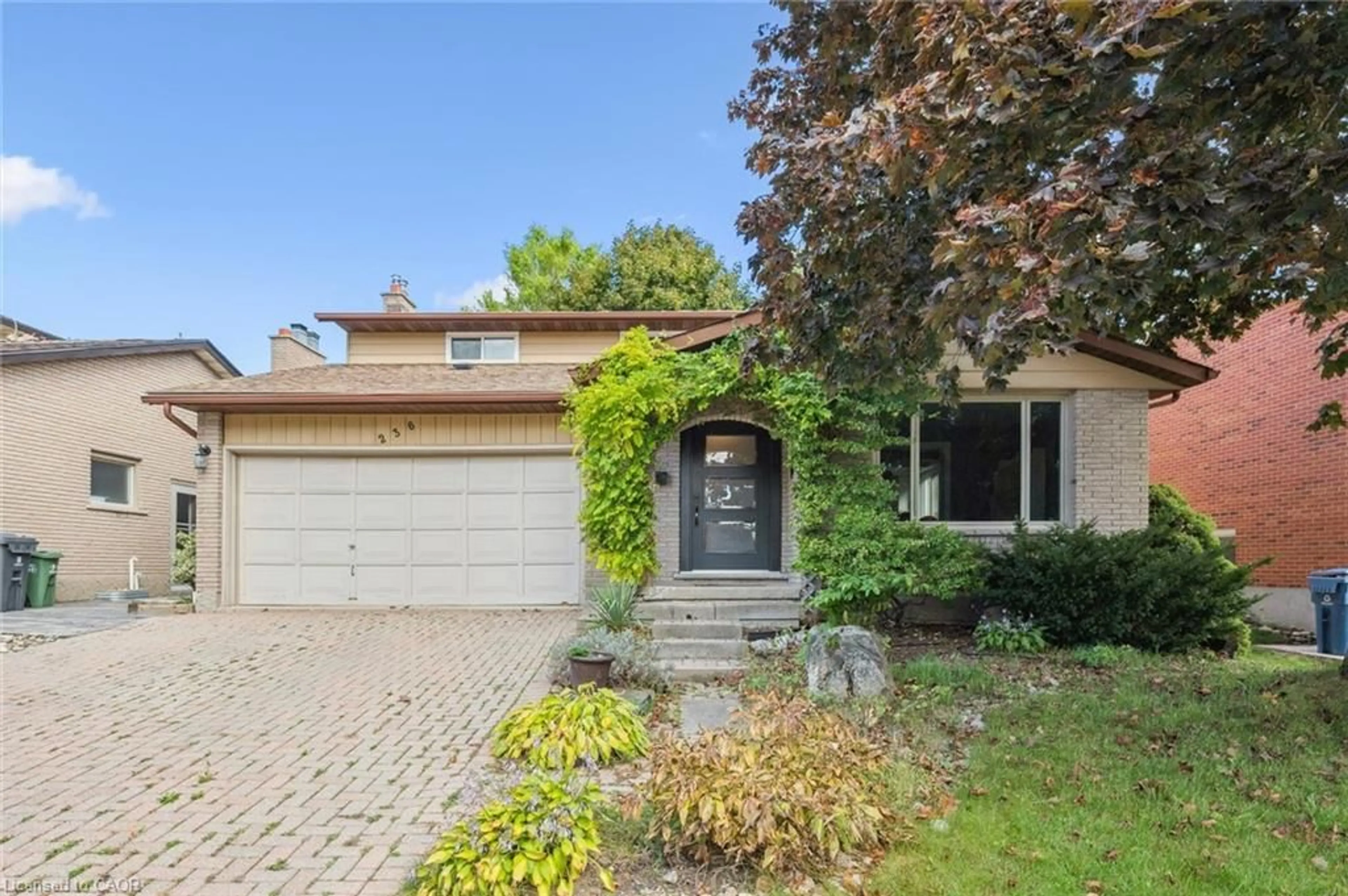 Home with brick exterior material, street for 236 Ironwood Rd, Guelph Ontario N1G 3G1