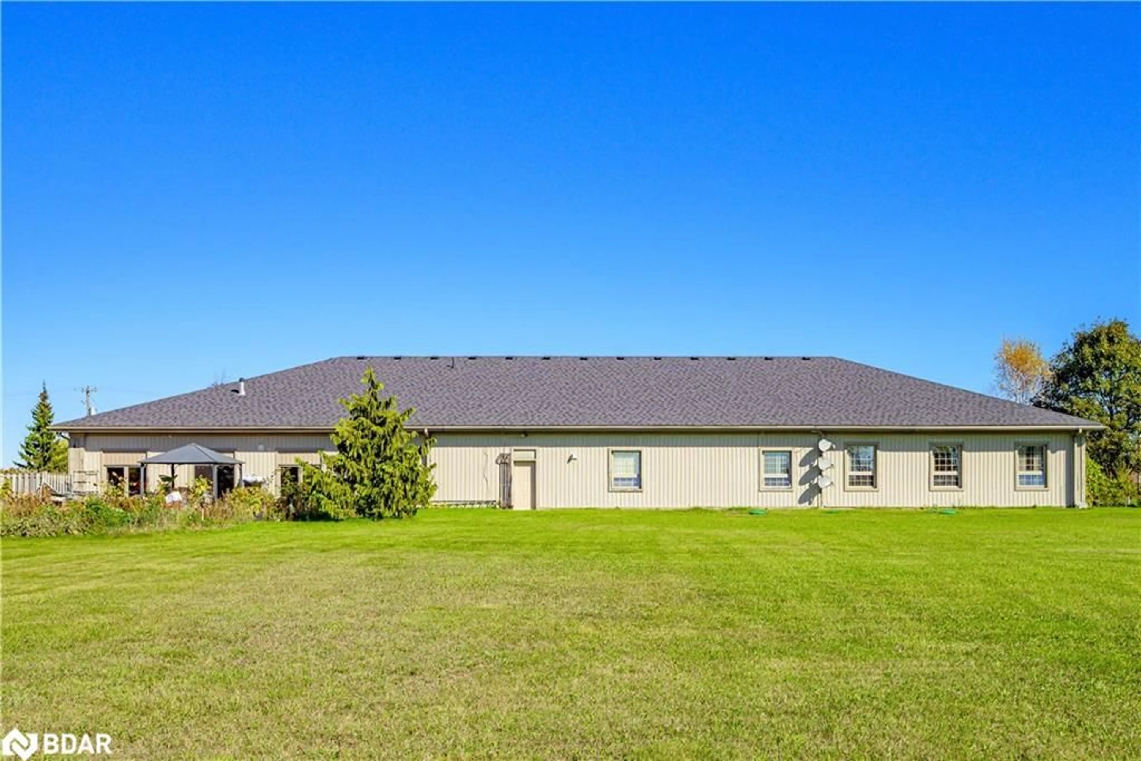 A pic from outside/outdoor area/front of a property/back of a property/a pic from drone, water/lake/river/ocean view for 2228 Indian River Line, Peterborough Ontario K0L 2B0