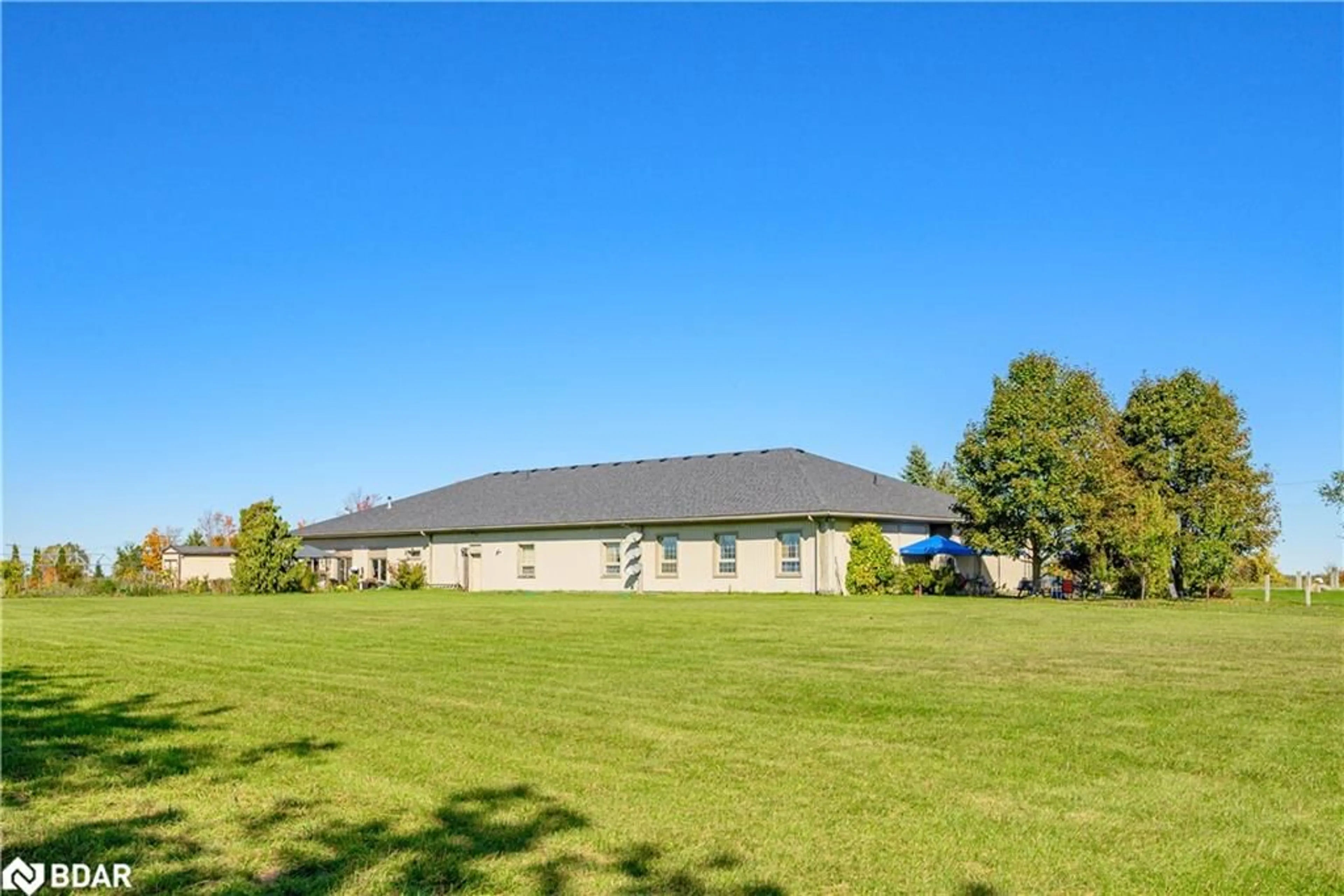 A pic from outside/outdoor area/front of a property/back of a property/a pic from drone, water/lake/river/ocean view for 2228 Indian River Line, Peterborough Ontario K0L 2B0