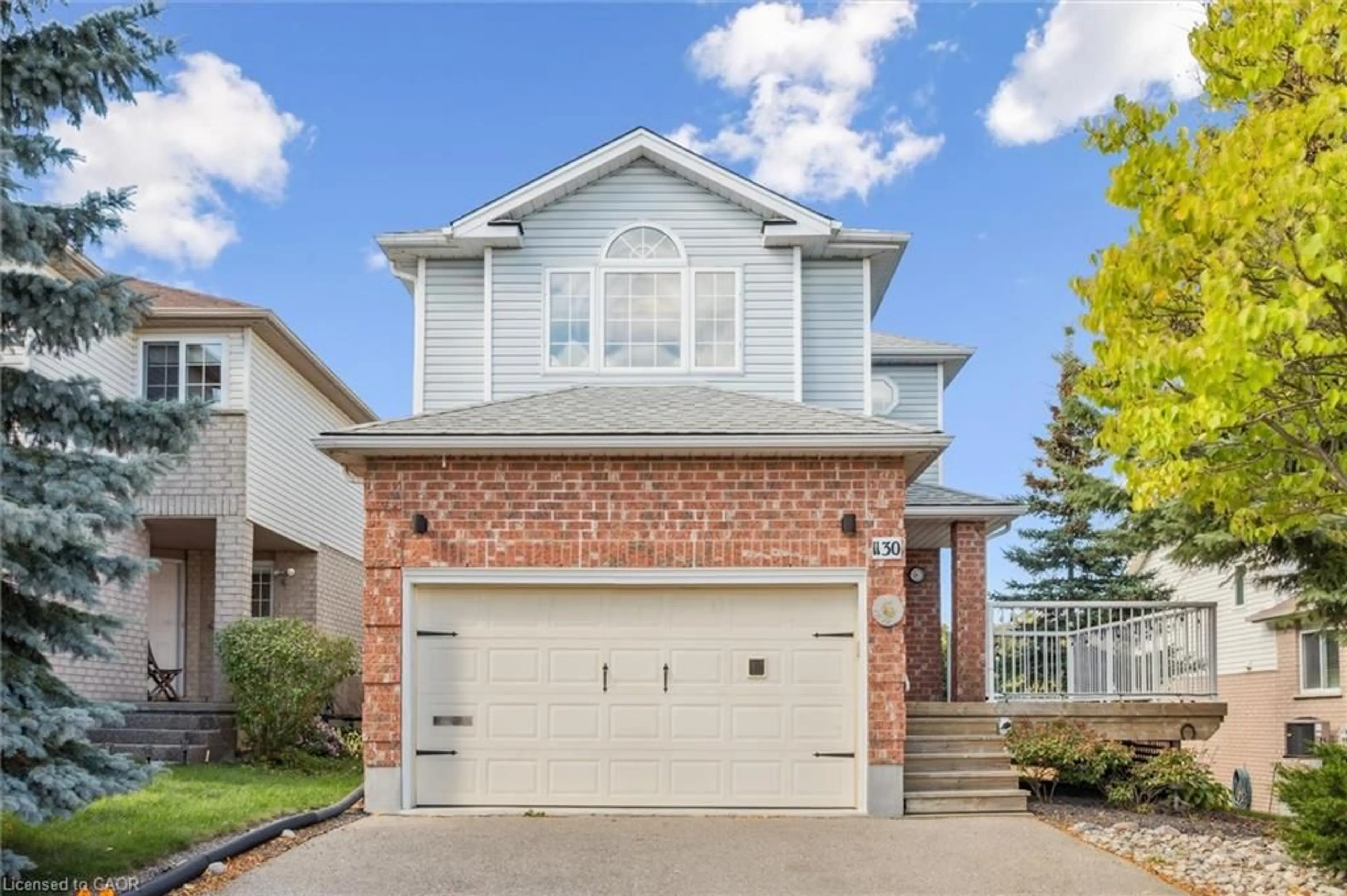 Home with brick exterior material, street for 1130 Countrystone Dr, Kitchener Ontario N2N 3L7
